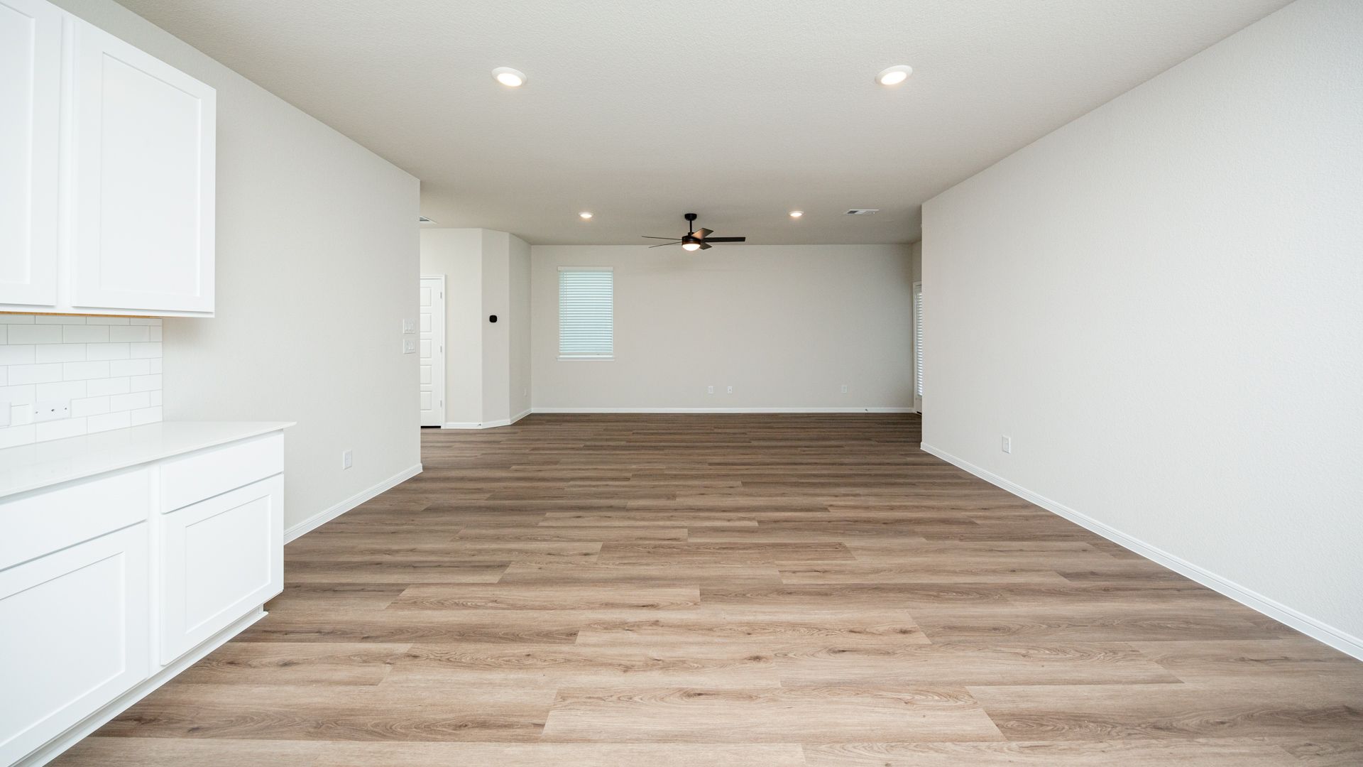Kitchen to Dining Area and Family Room