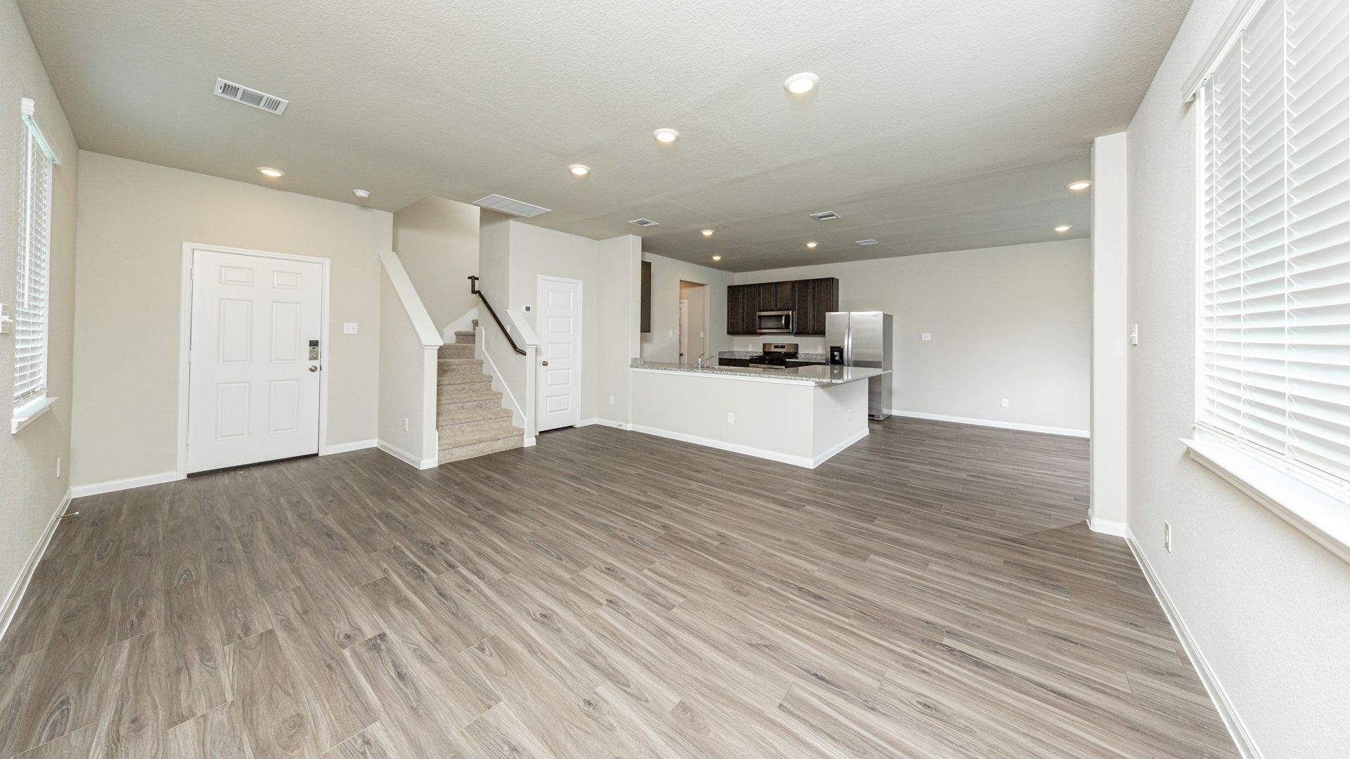 Family Room to Kitchen and Dining Area