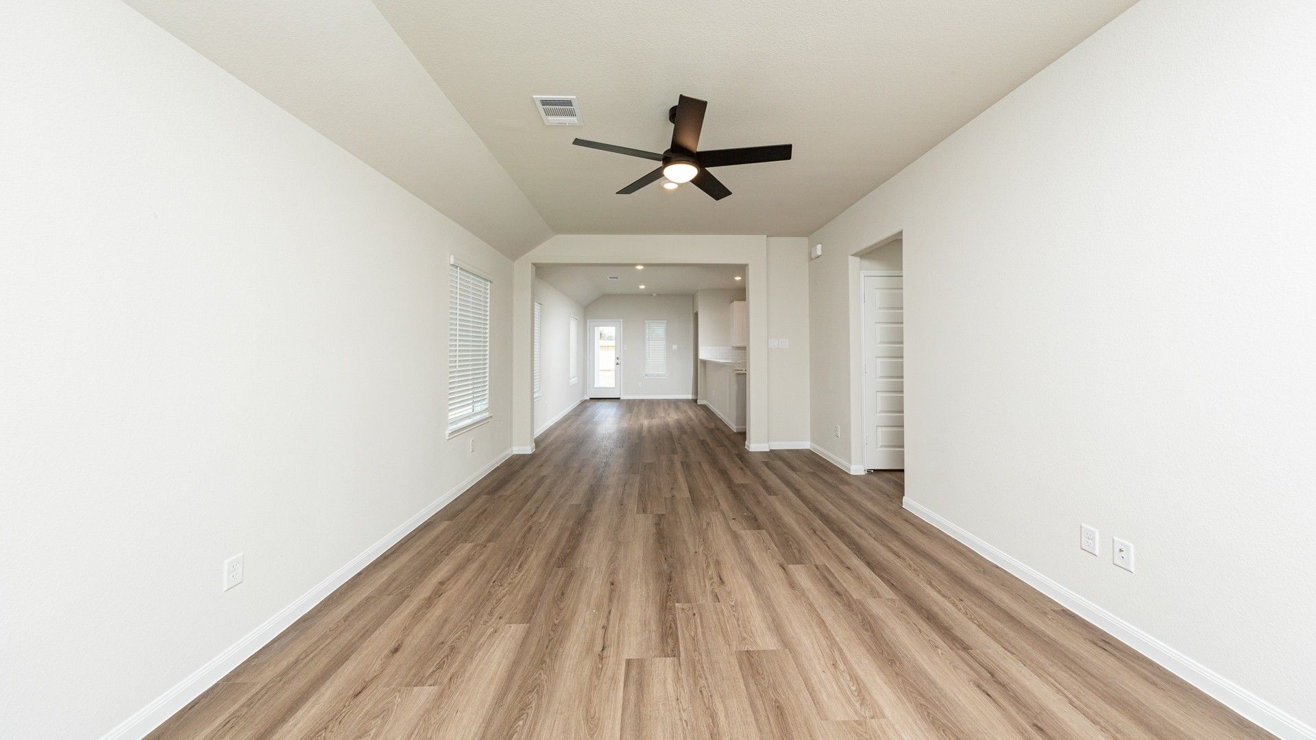 Family Room to Dining Area and Kitchen