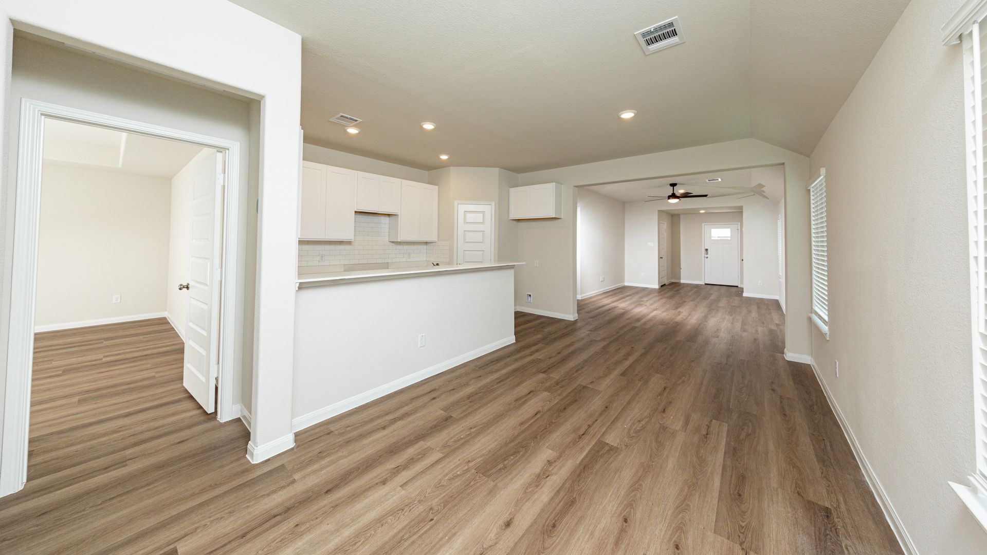 Dining Area to Kitchen and Family Room