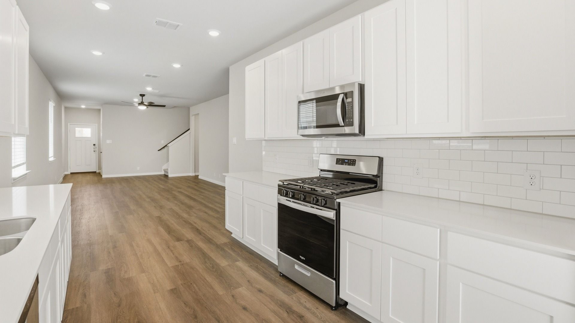 Kitchen to Dining Area and Family Room