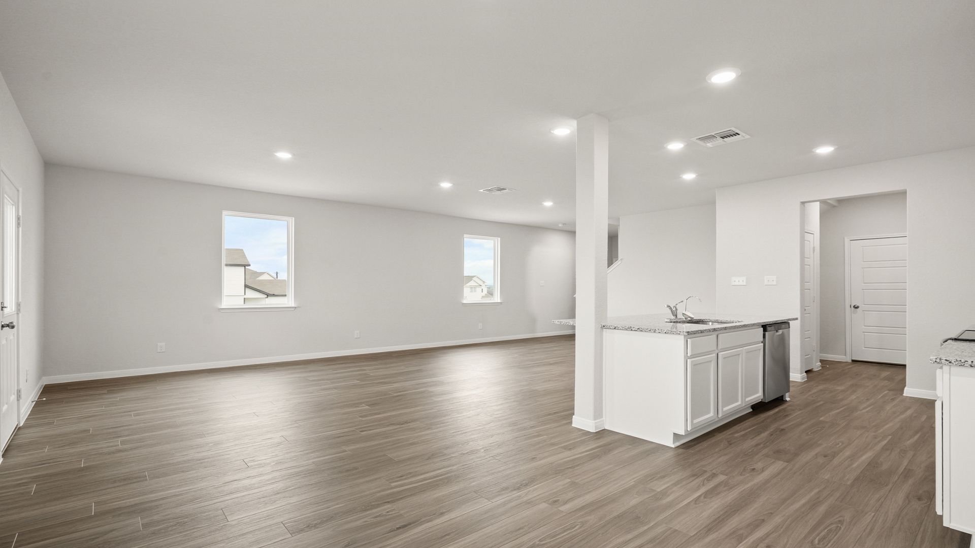 Dining to Family Room and Kitchen