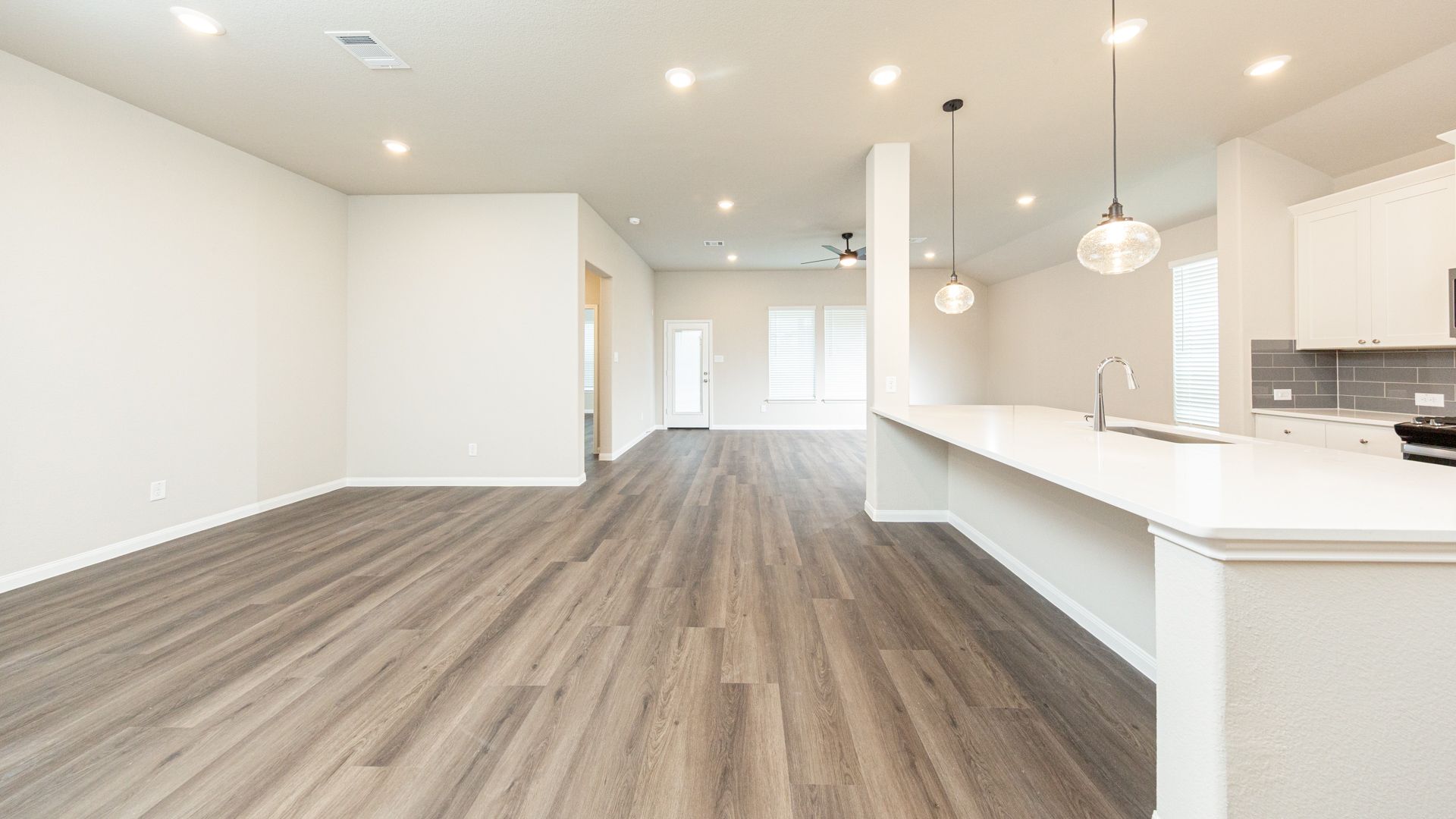 Dining Area and Kitchen to Family Room