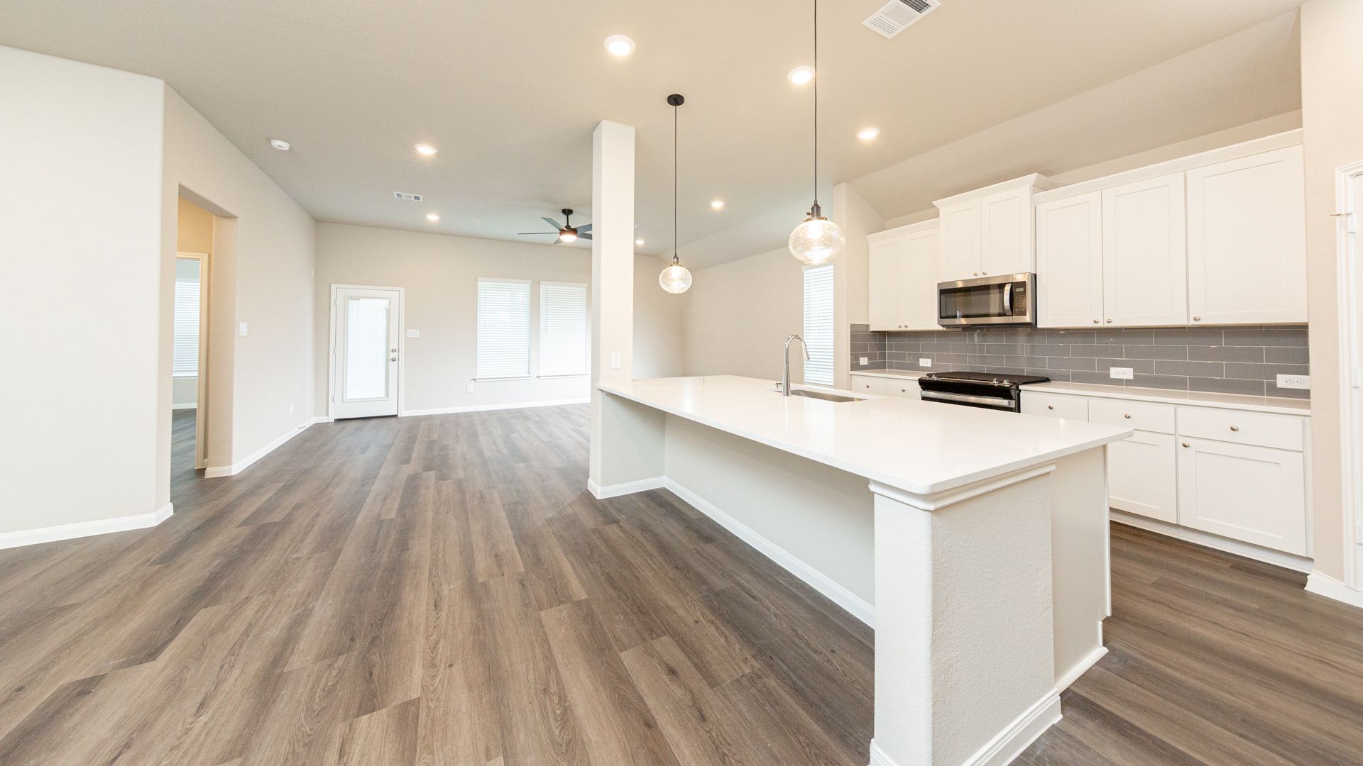 Dining Area and Kitchen to Family Room