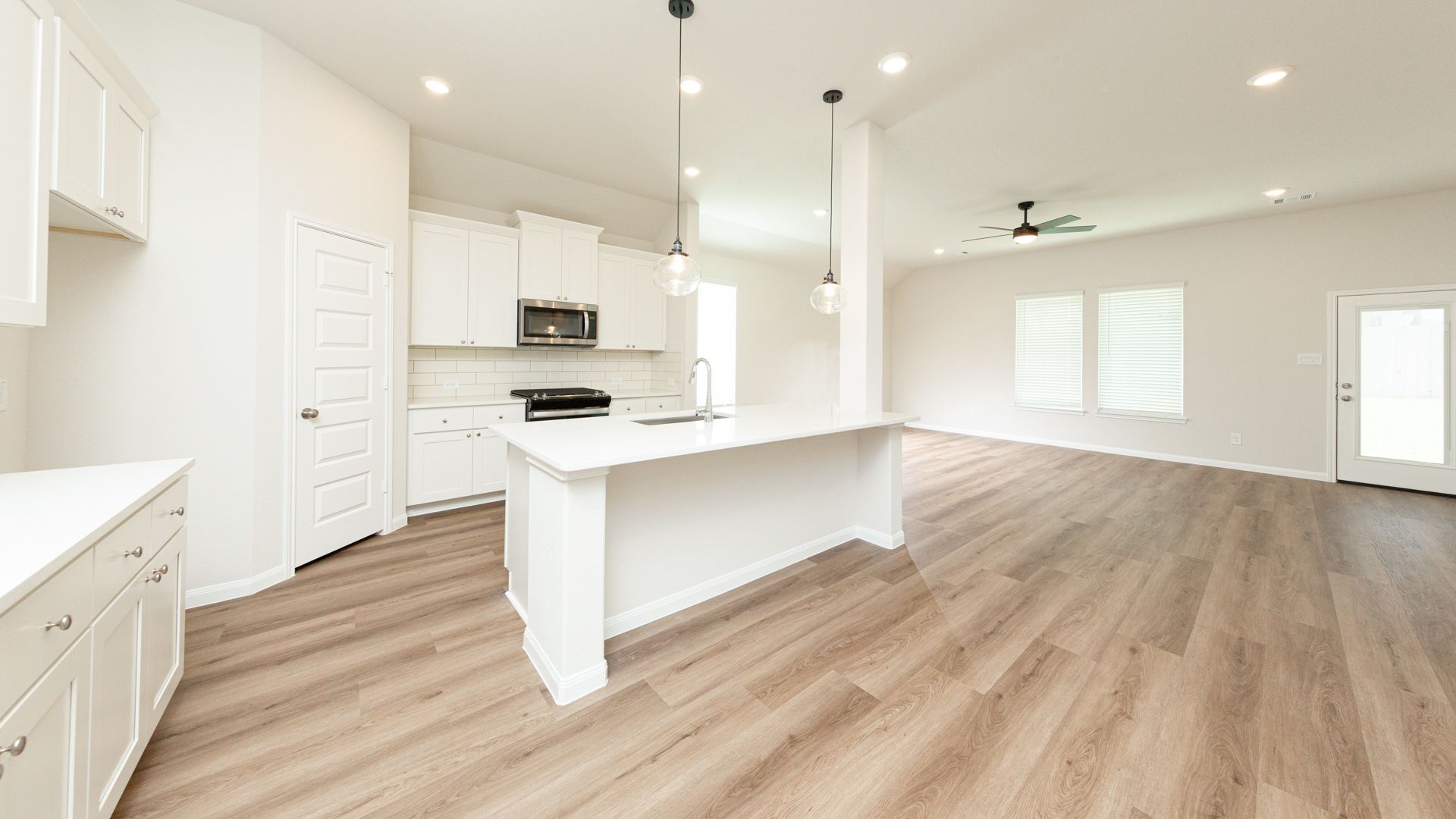 Dining Area to Kitchen and Family Room