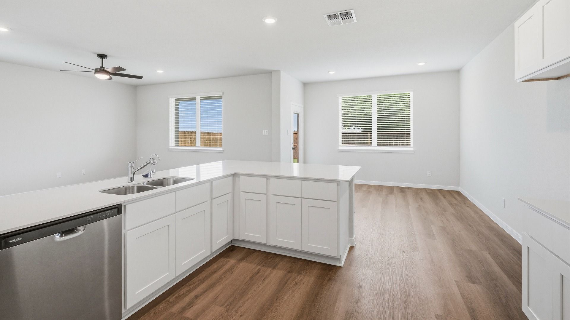Kitchen to Dining Area and Family Room