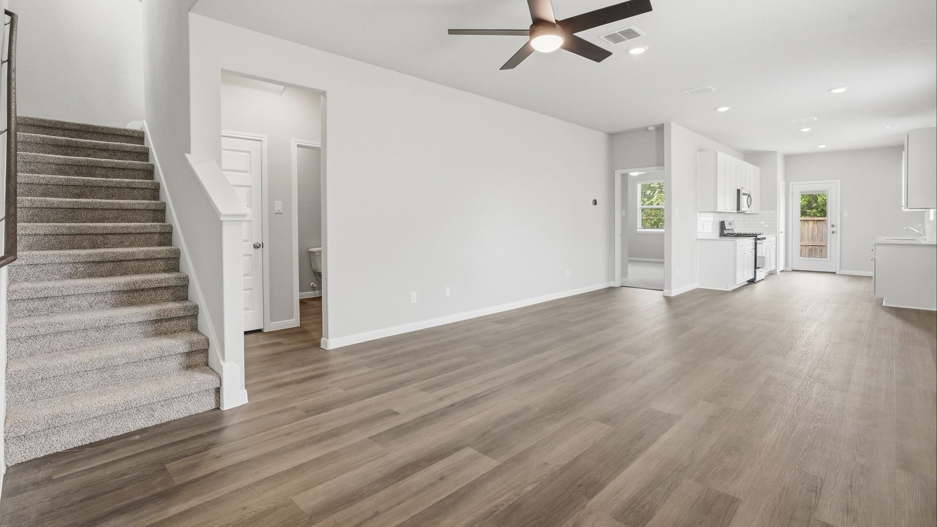 Family Room to Dining Area and Kitchen