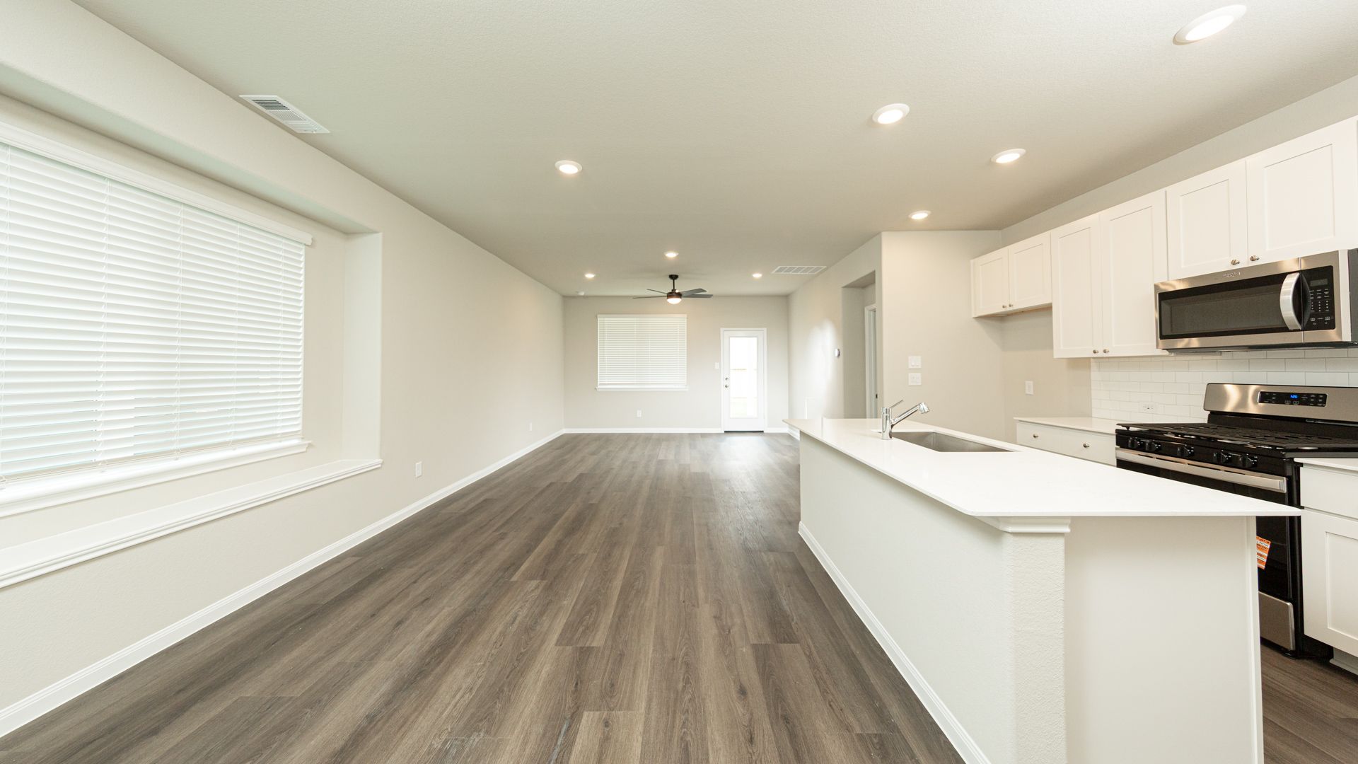 Kitchen to Dining Area and Family Room