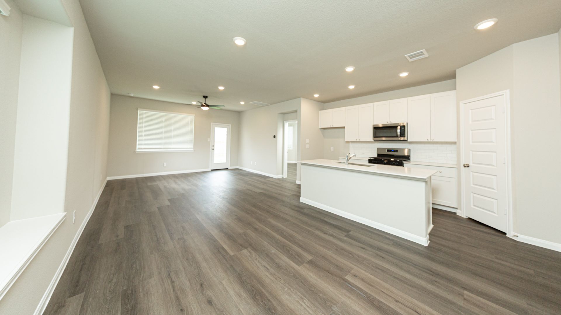 Kitchen to Dining Area and Family Room