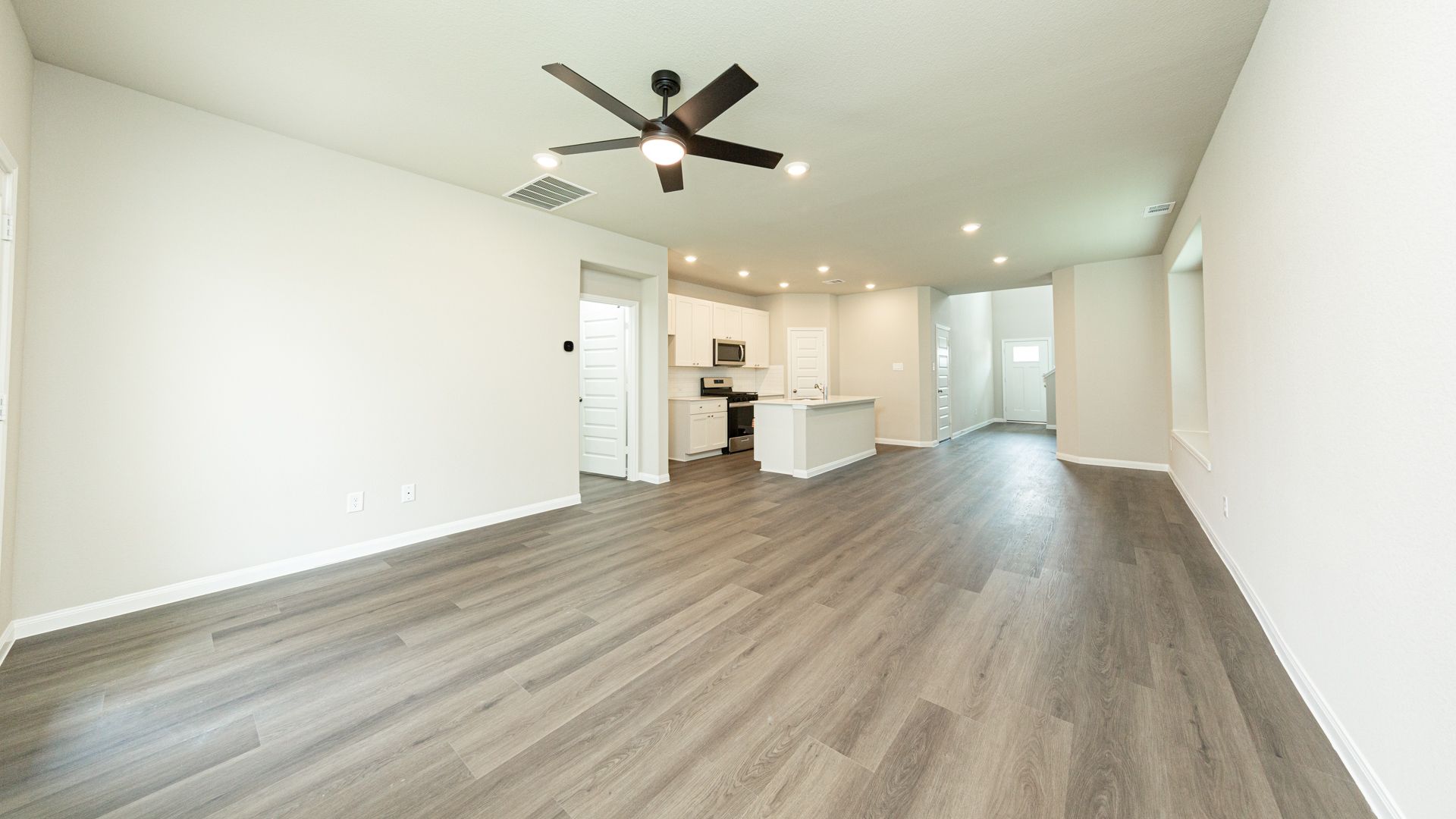 Family Room to Dining Area and Kitchen