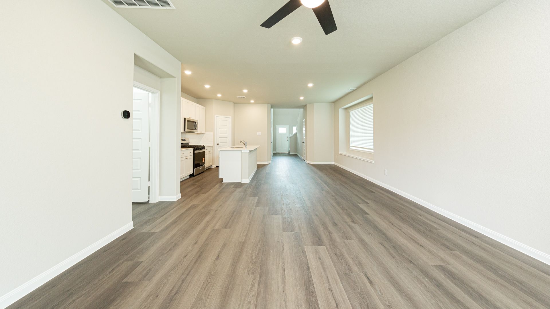 Family Room to Dining Area and Kitchen