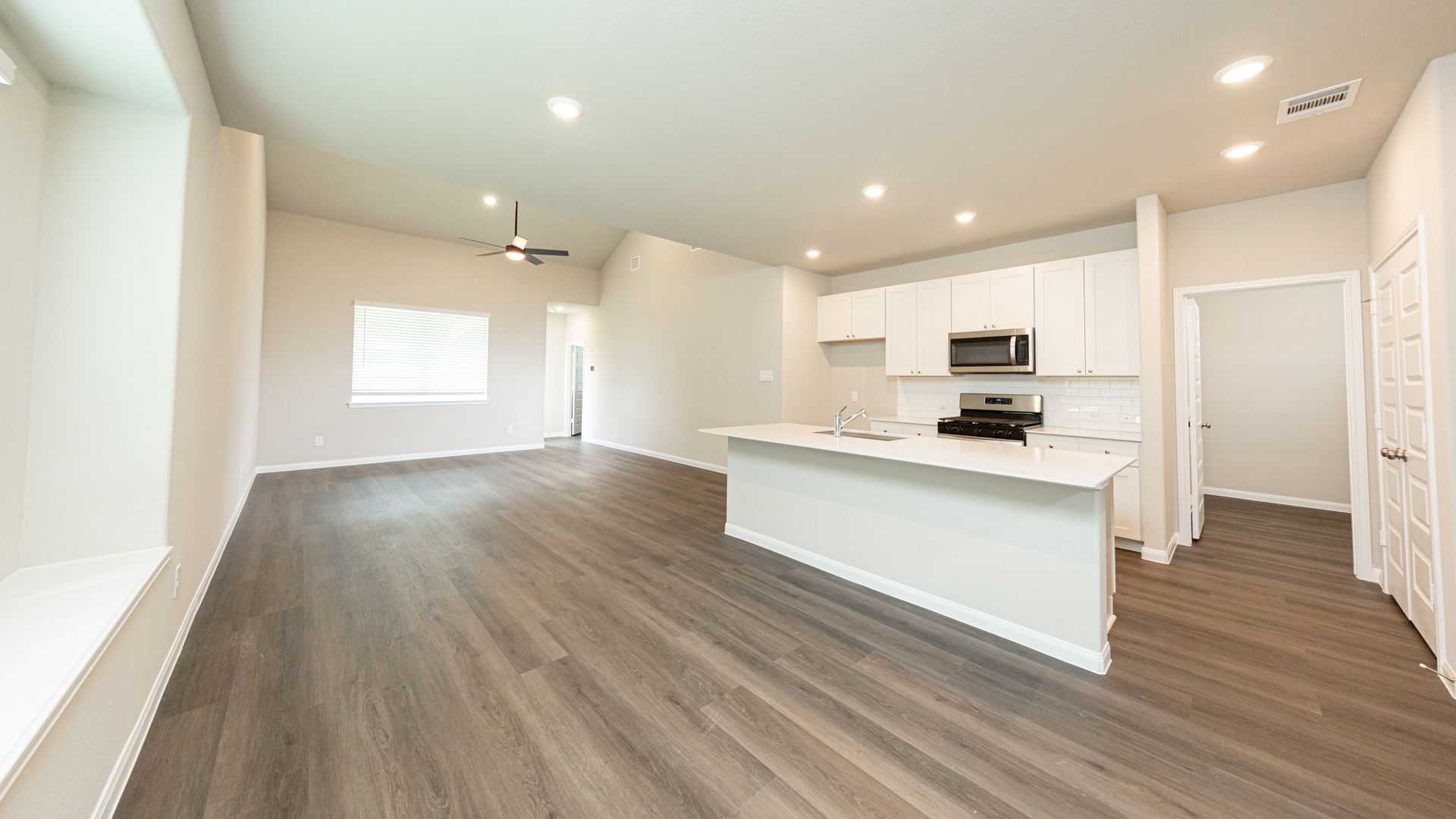 Kitchen to Dining Area and Family Room