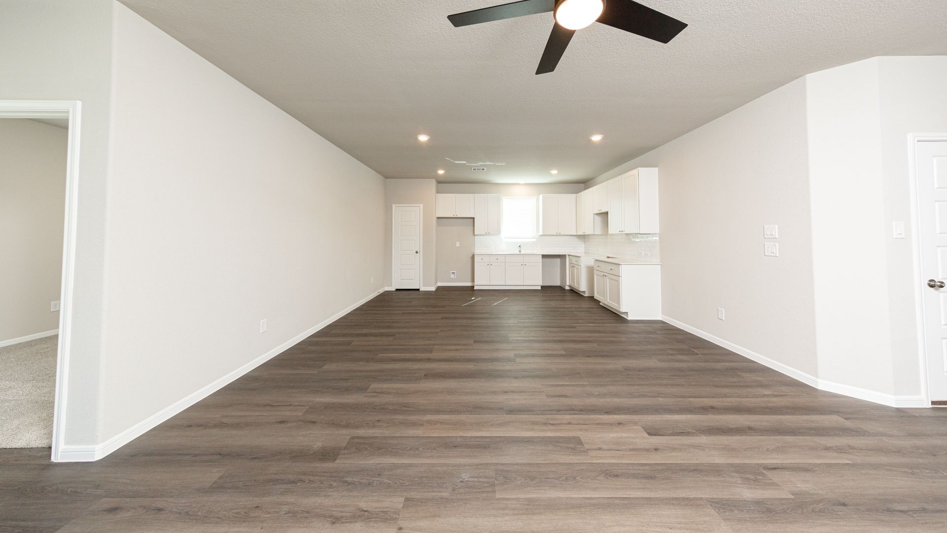 Family Room to Dining Area and Kitchen