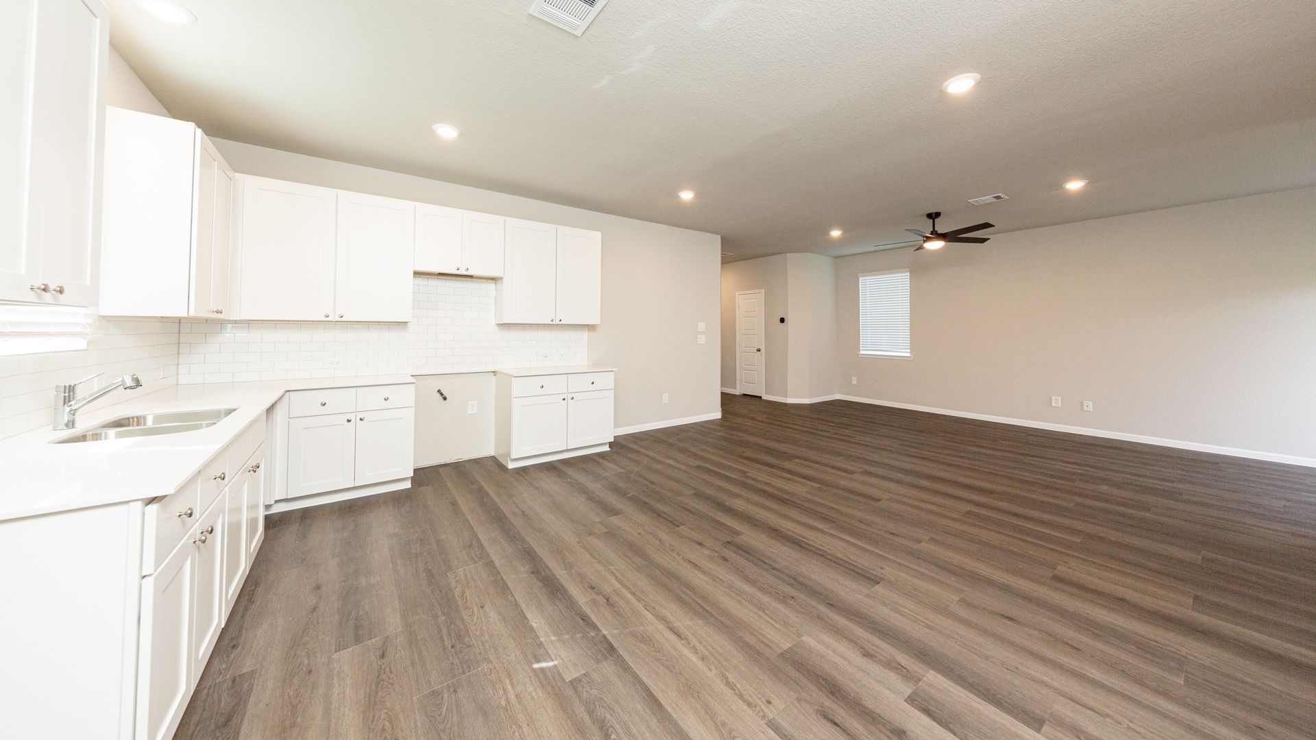 Kitchen to Dining Area and Family Room