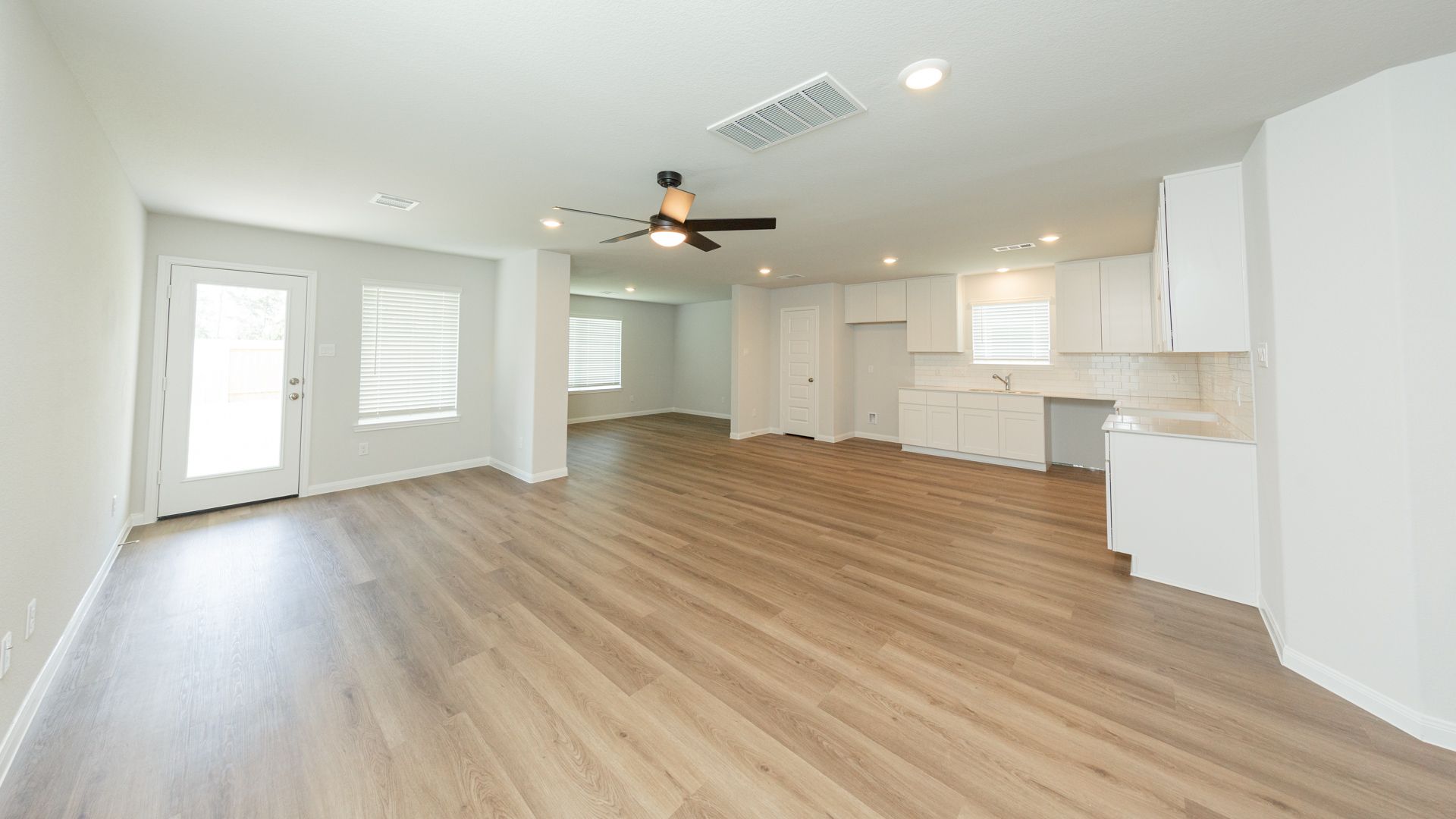 Family Room to Dining Area, Kitchen, and Flex Room