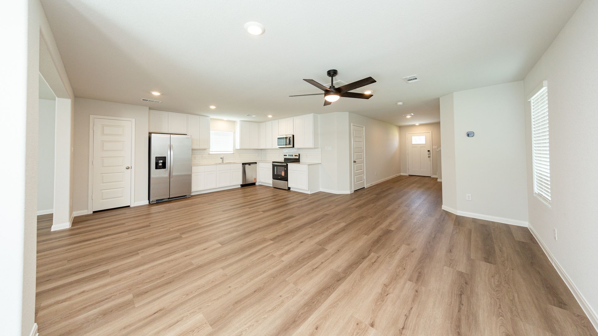 Family Room to Dining Area and Kitchen
