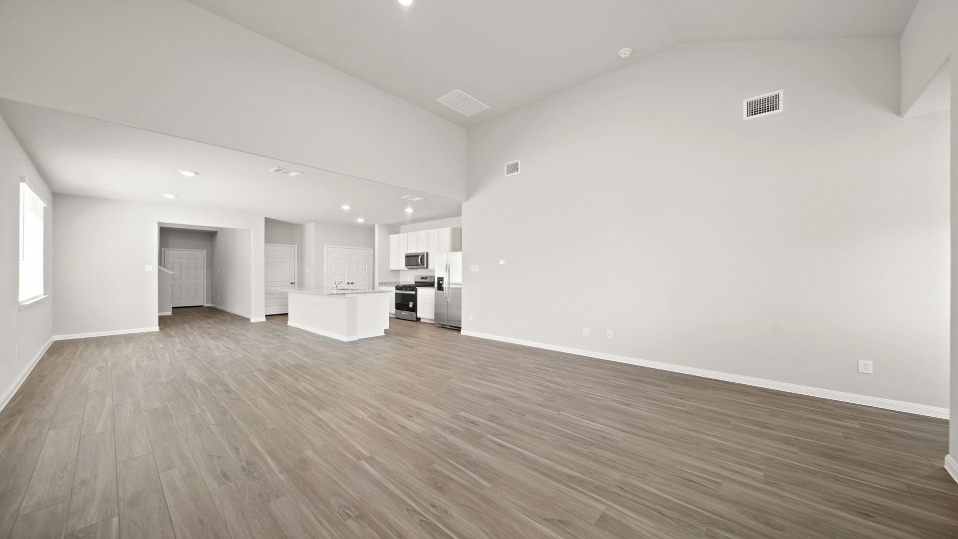 Family Room to Kitchen and Dining Area