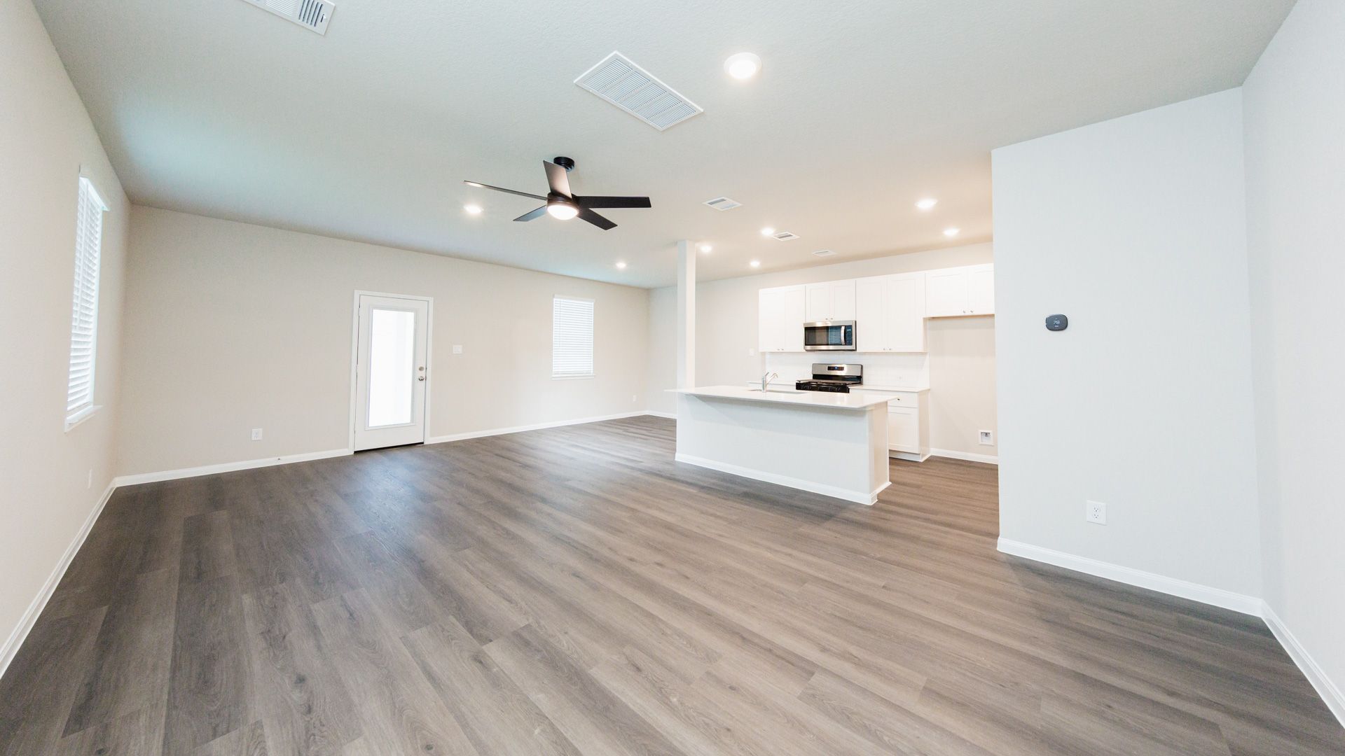 Family Room to Kitchen and Dining Area