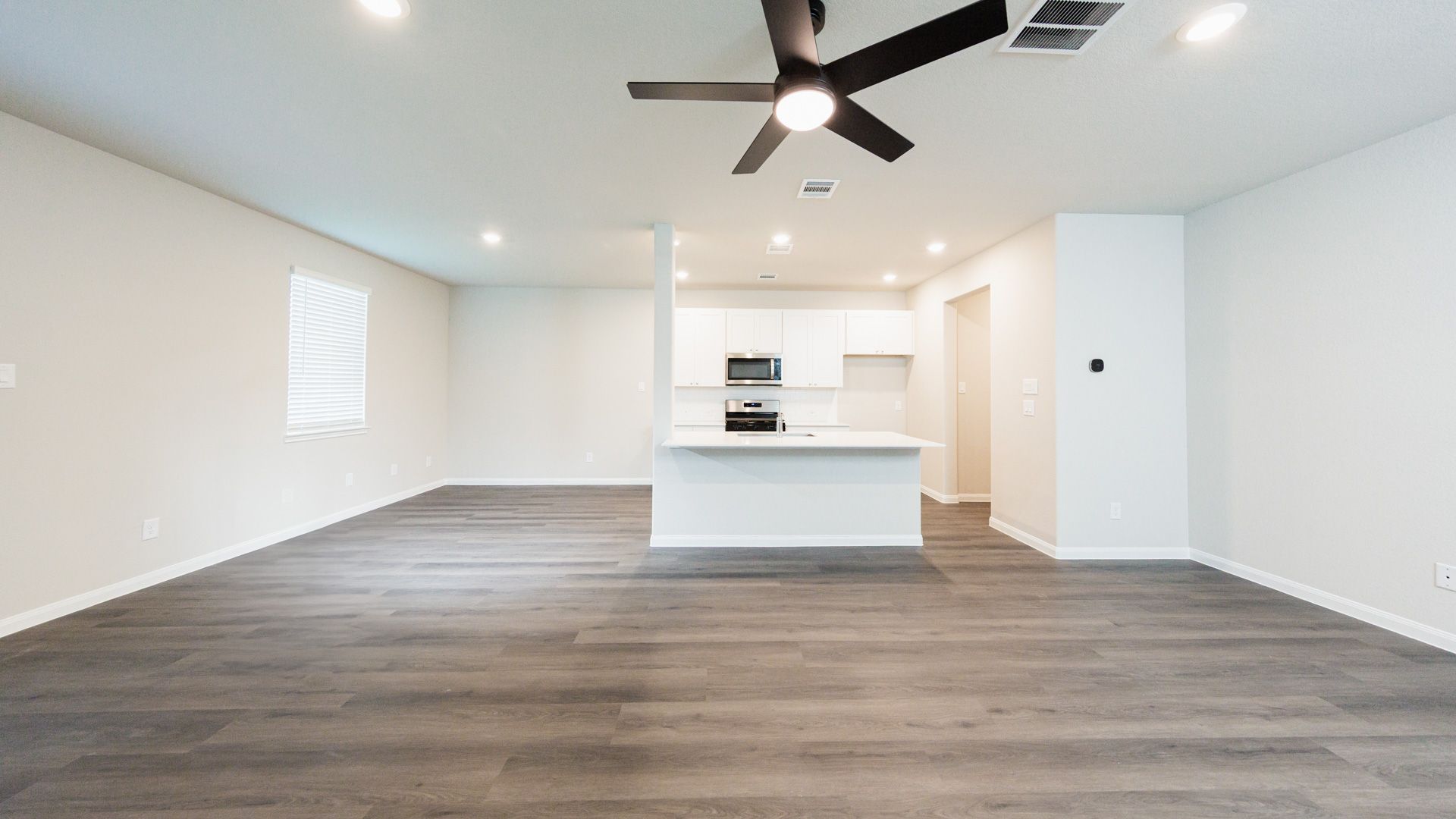 Family Room to Kitchen and Dining Area