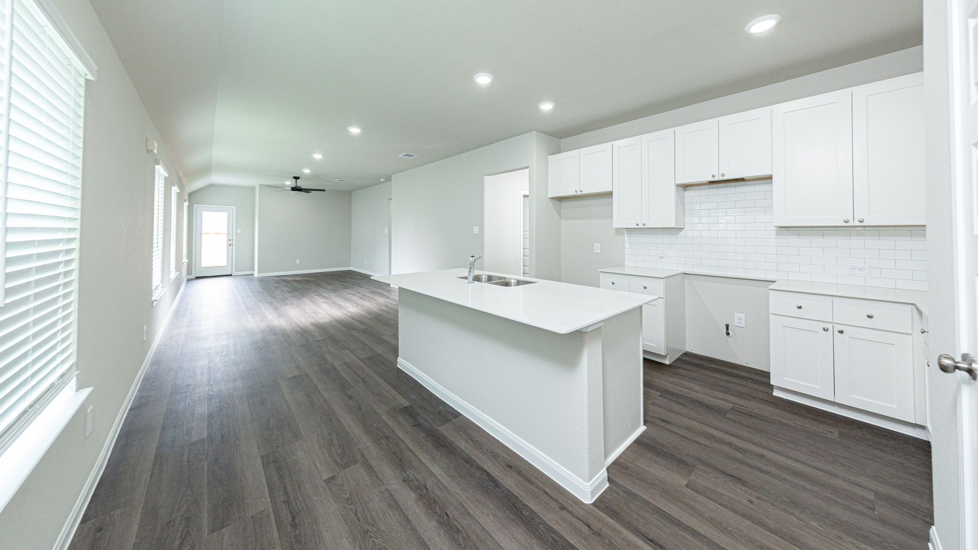 Kitchen to Dining Area and Family Room