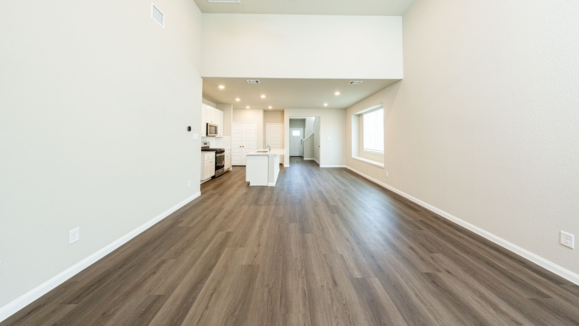 Family Room to Dining Area and Kitchen