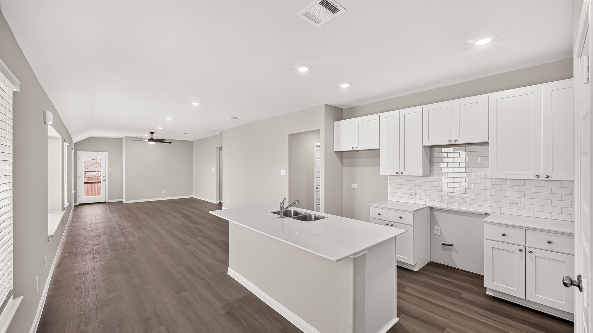 Kitchen to Dining Area and Family Room