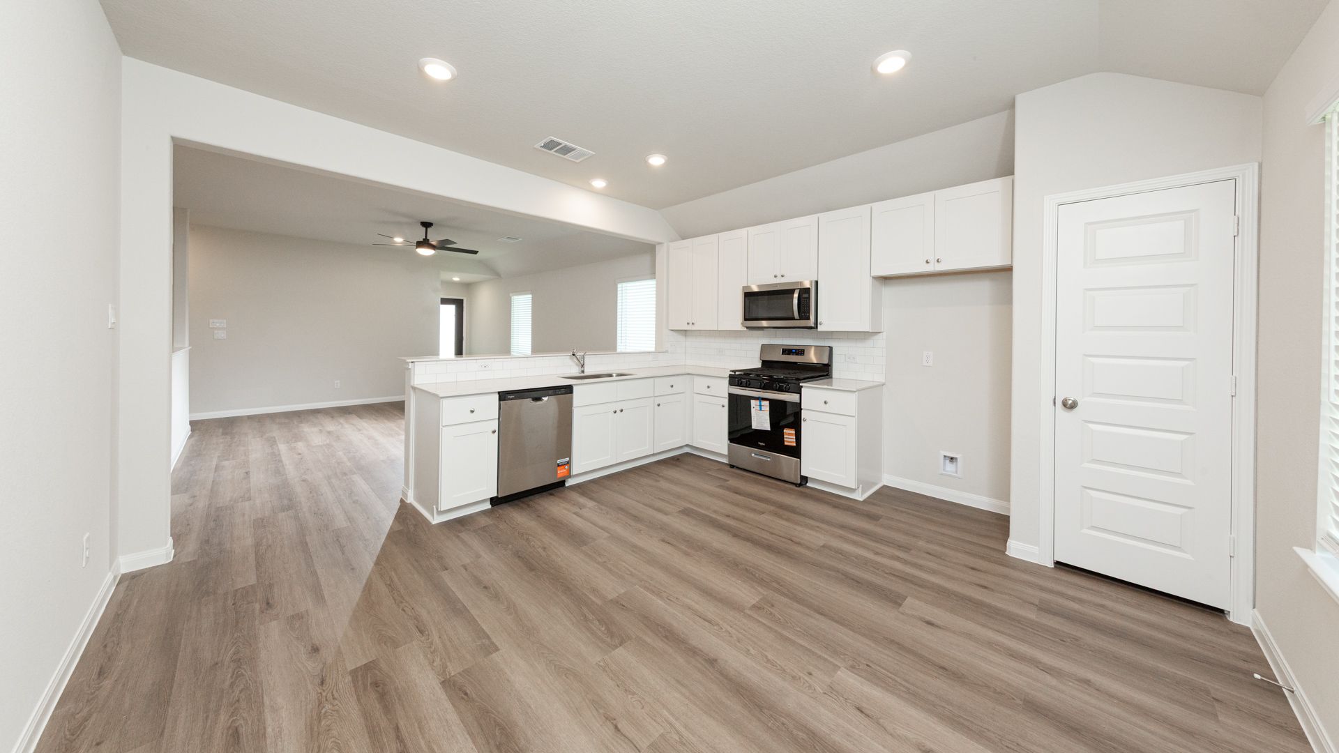 Kitchen and Dining Area to Family Room