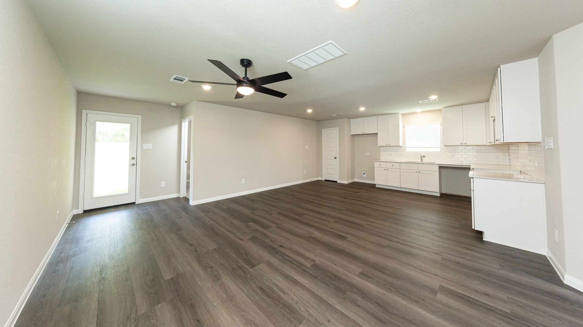 Family Room to Dining Area and Kitchen