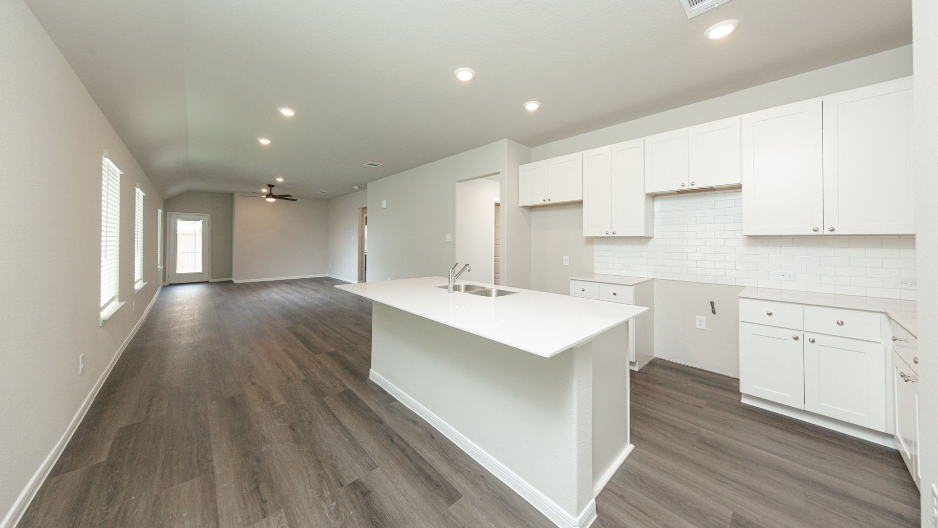 Kitchen to Dining Area and Family Room