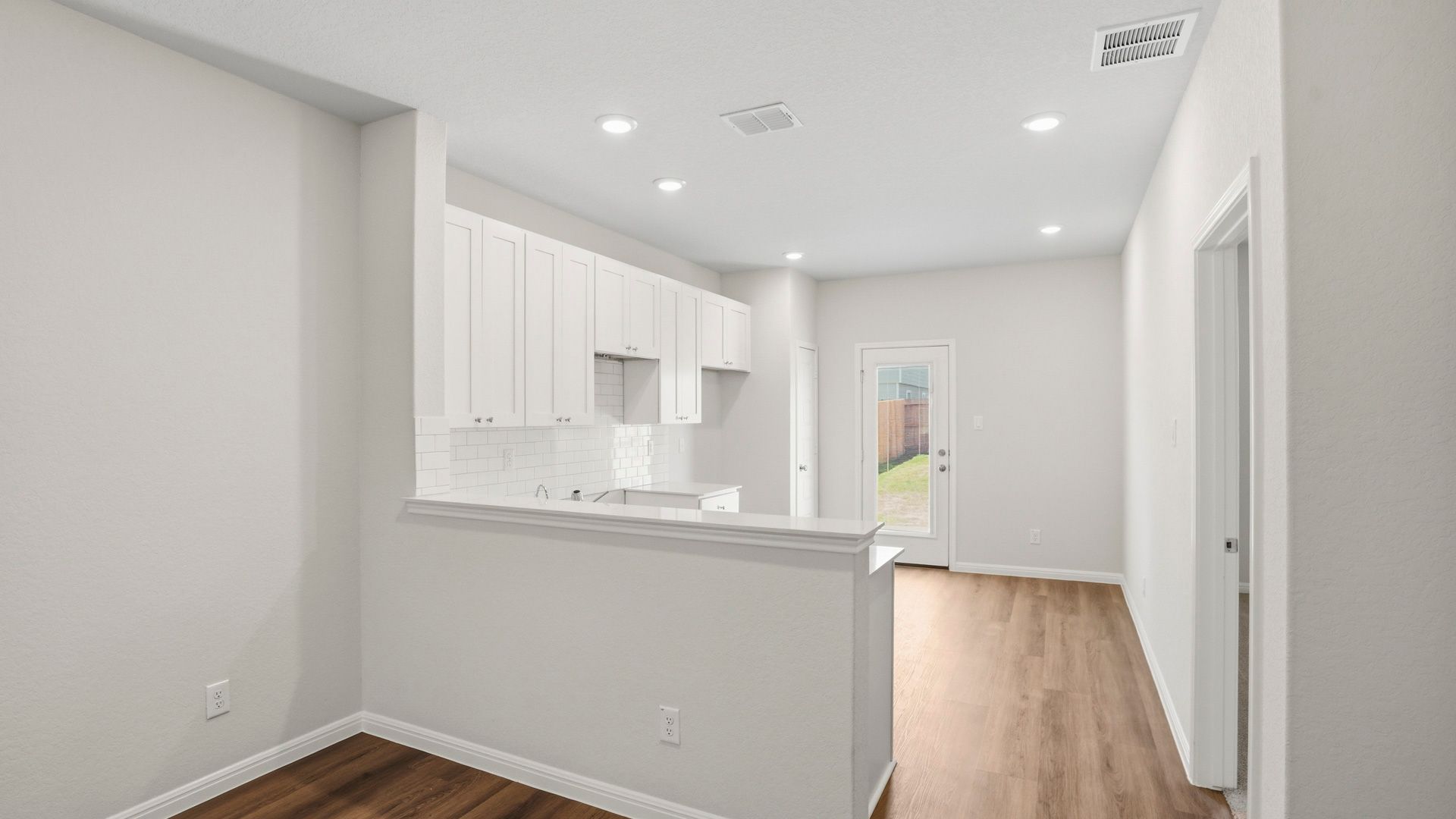 Family room to dining area and kitchen