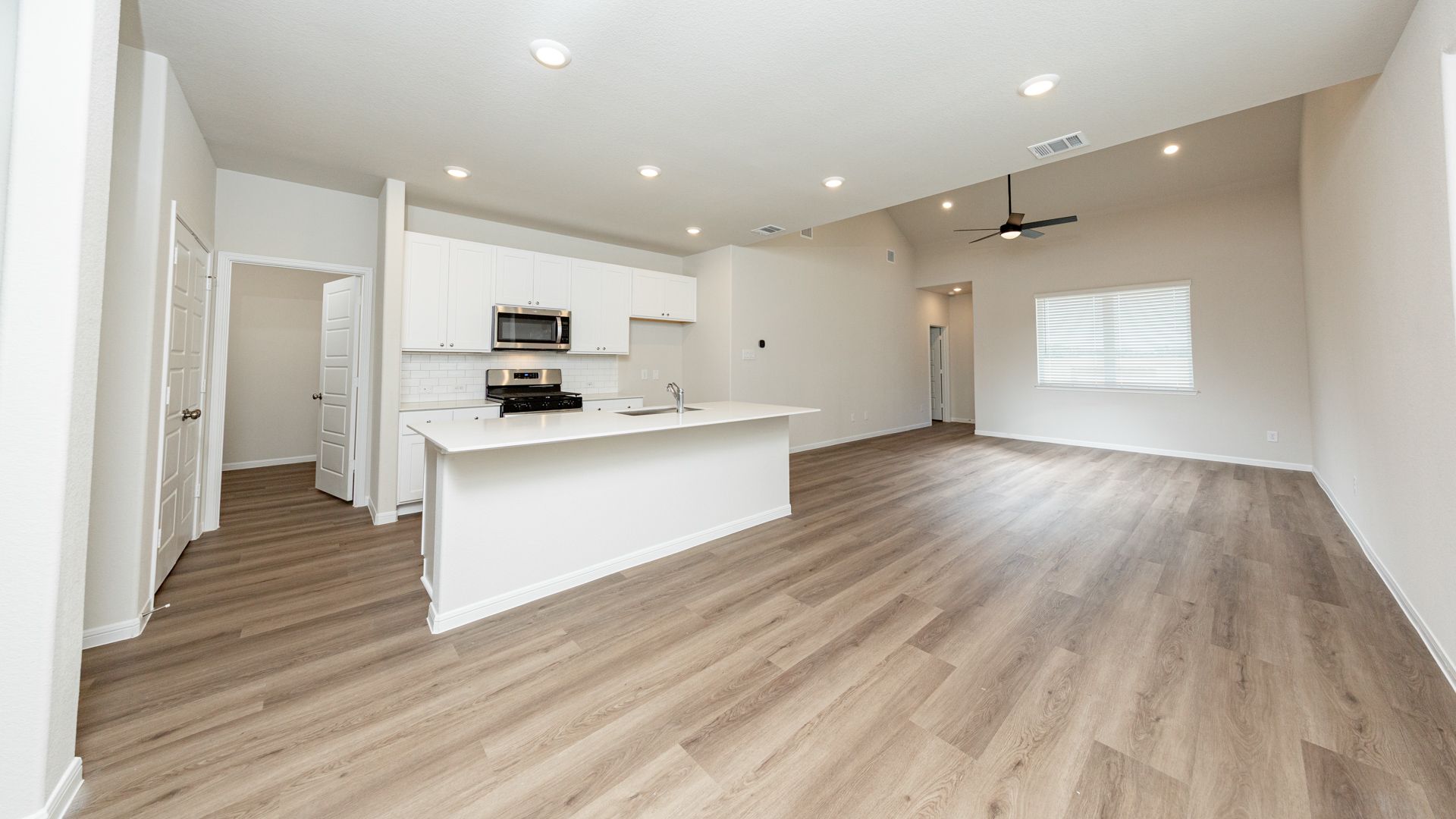 Dining Area to Kitchen and Family Room