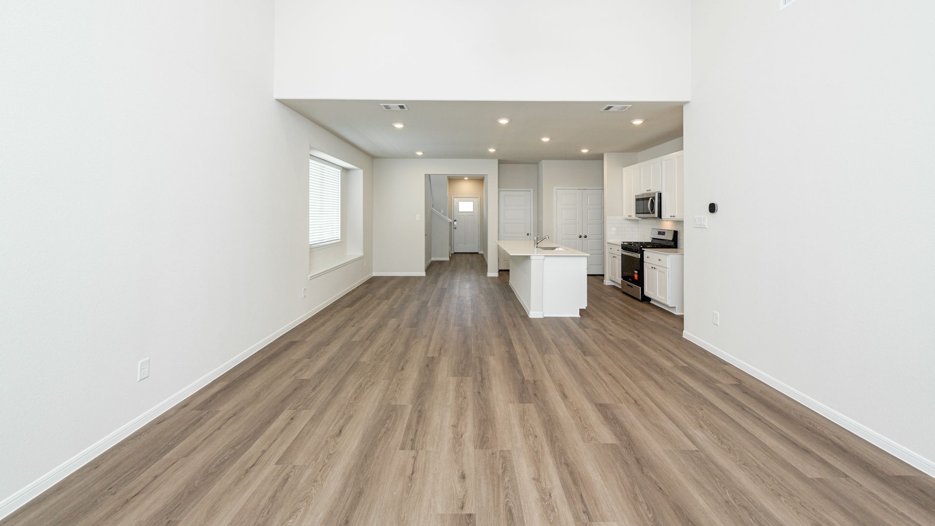 Family Room to Dining Area and Kitchen