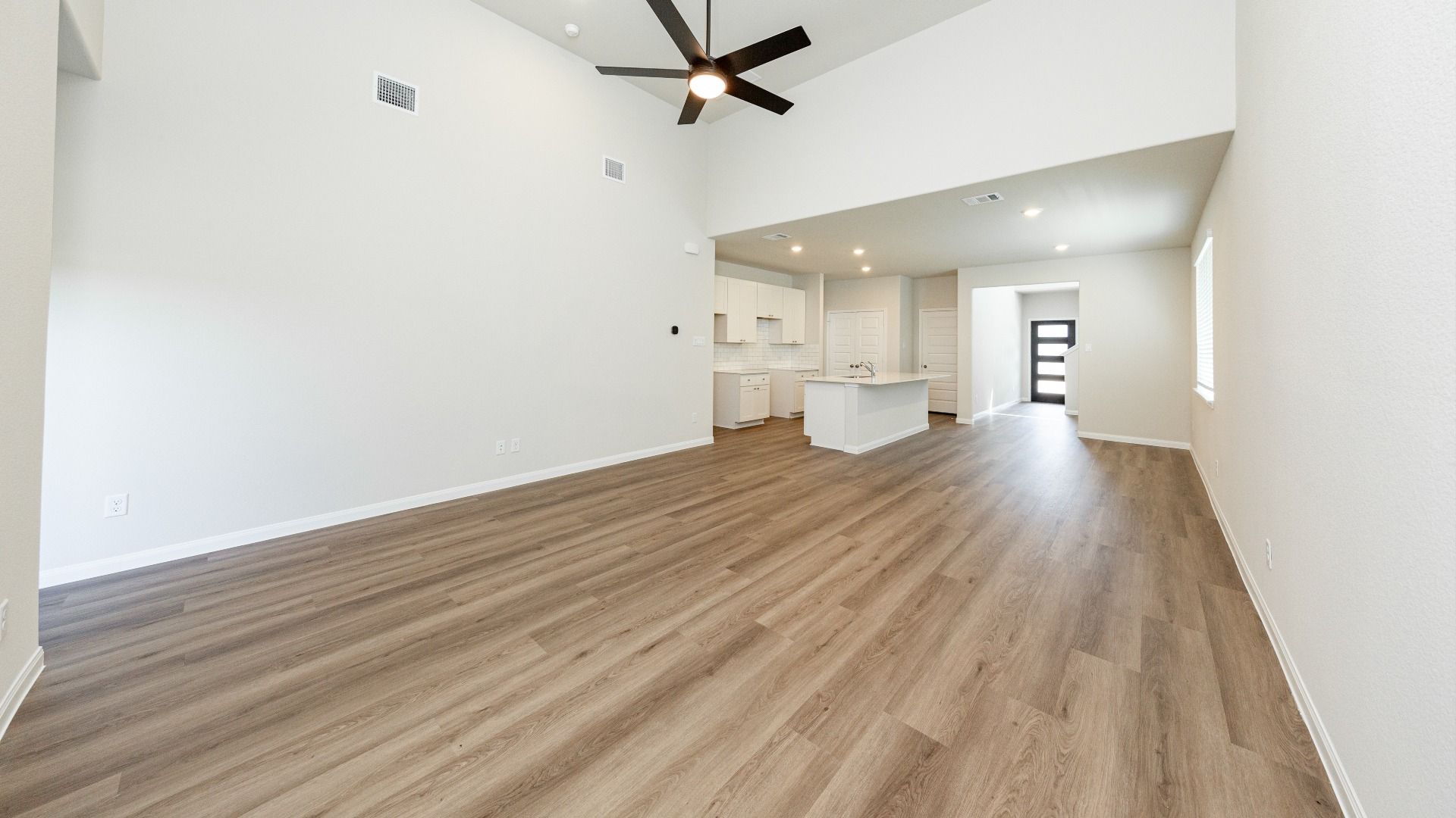 Family Room to Kitchen and Dining Area