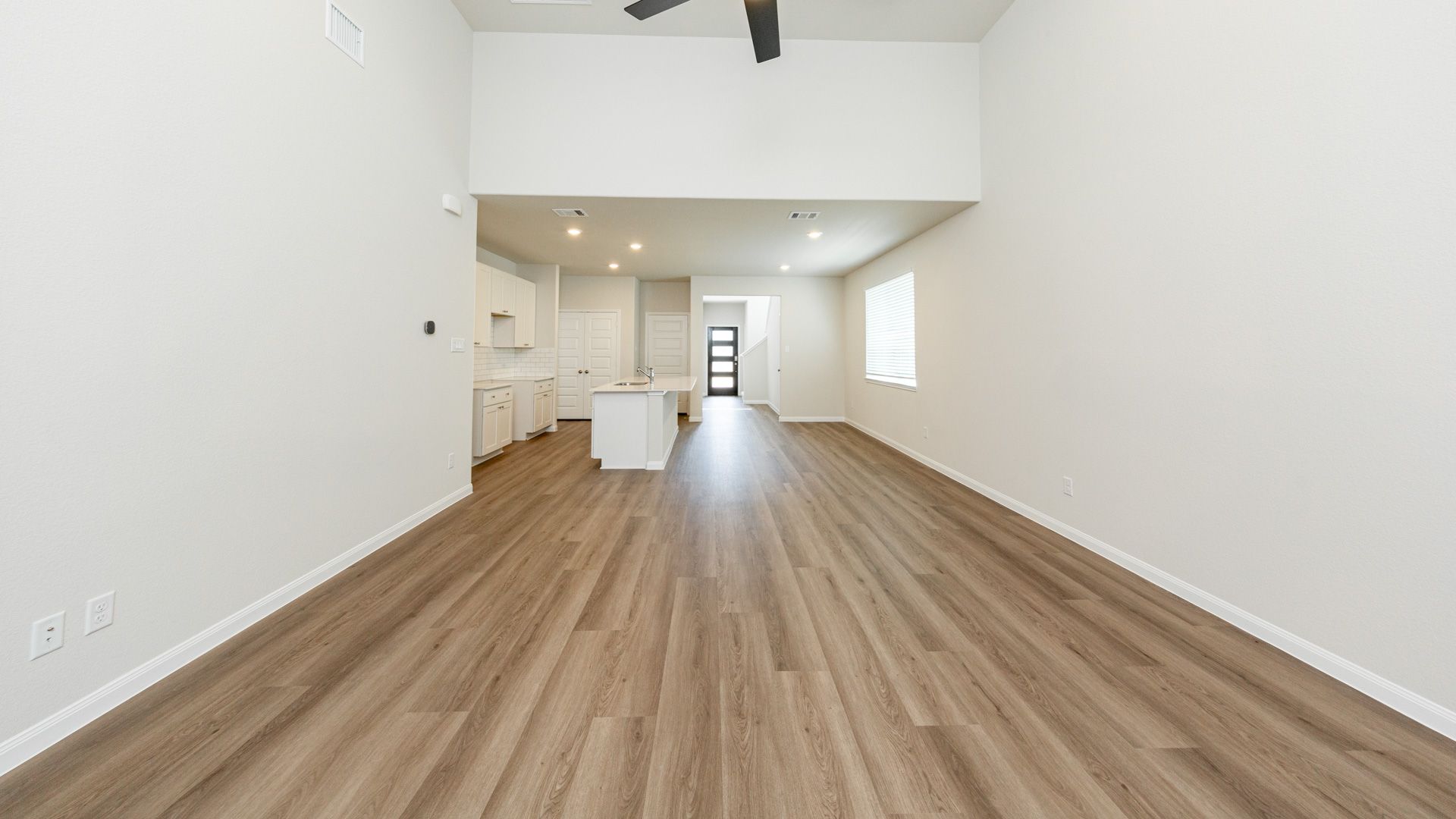 Family Room to Kitchen and Dining Area