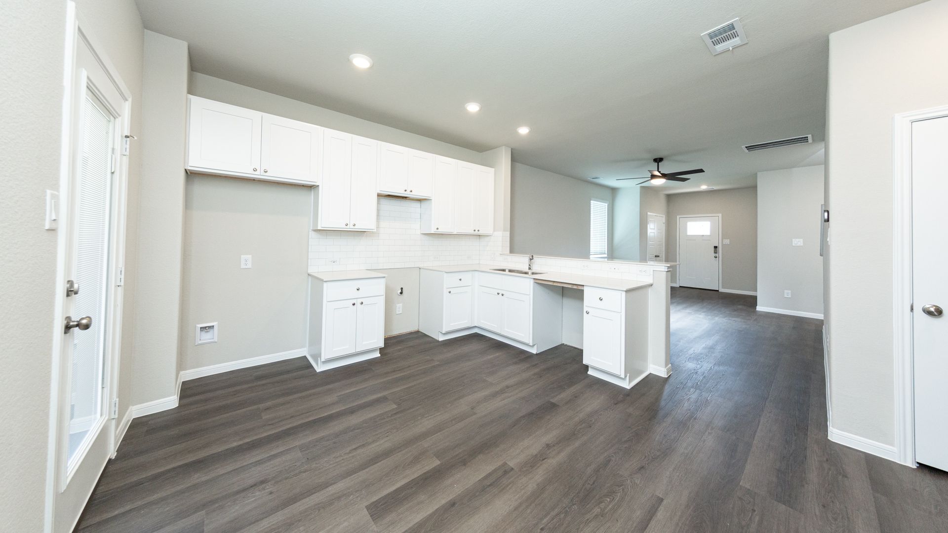 Kitchen and Dining Area to Family Room