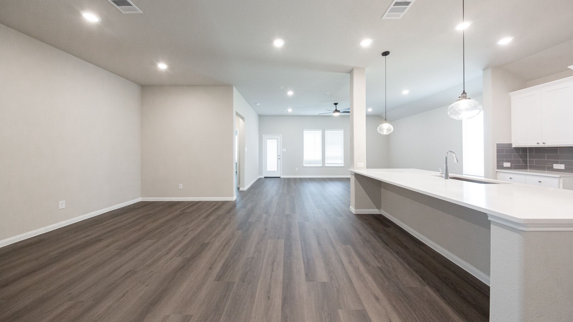 Dining Area and Kitchen to Family Room