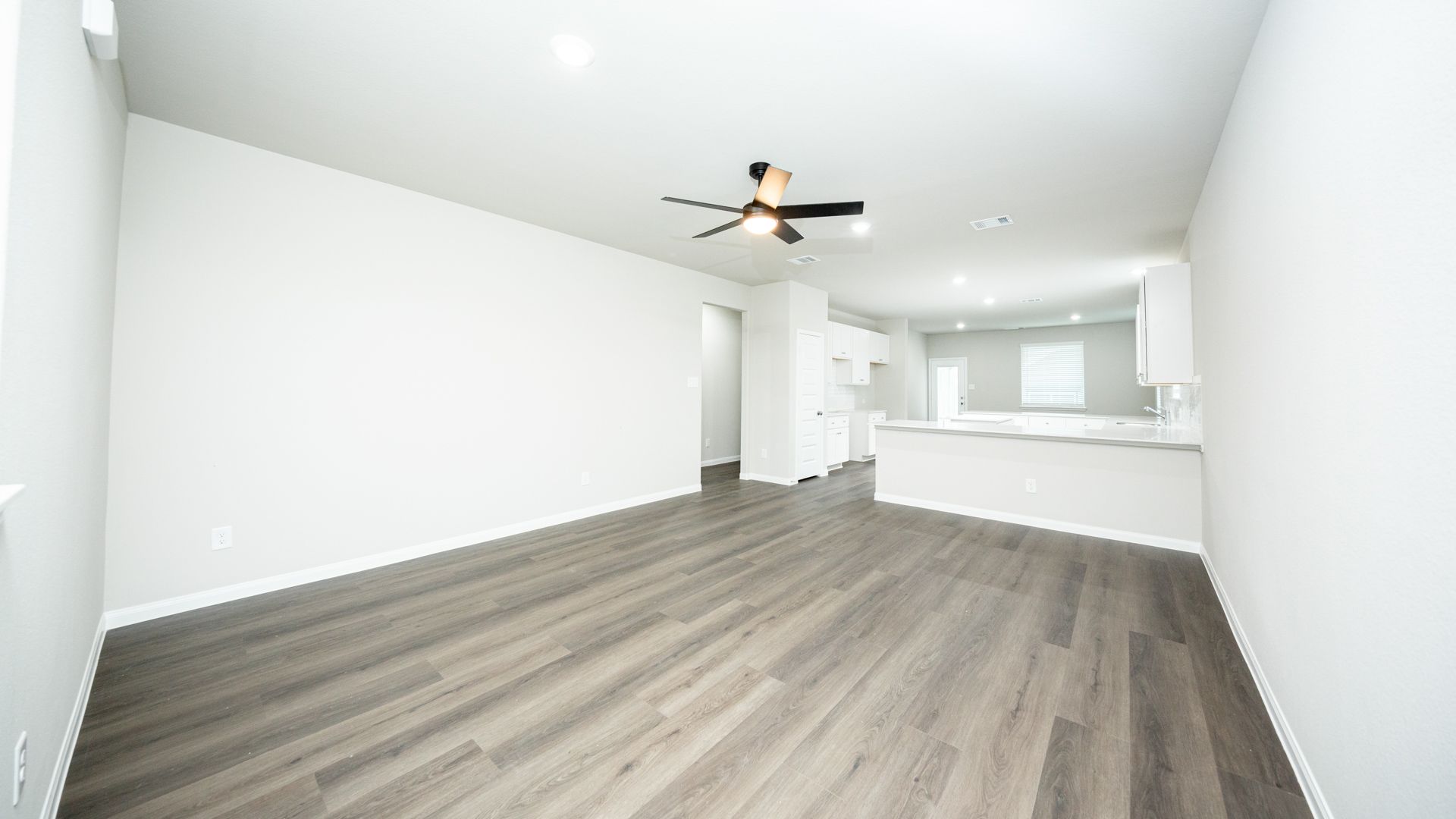 Family Room to Kitchen and Dining Area