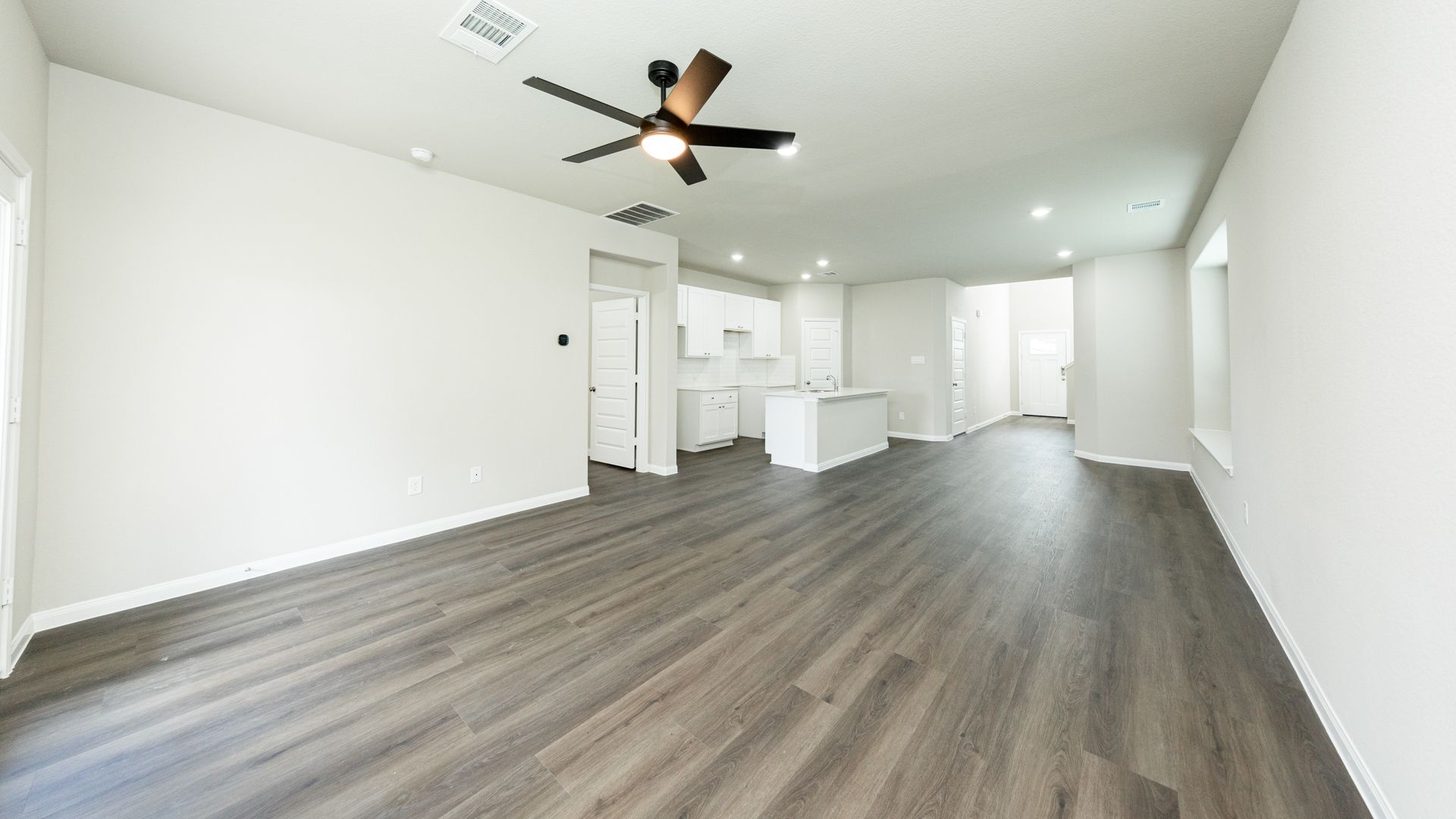 Family Room to Dining Area and Kitchen
