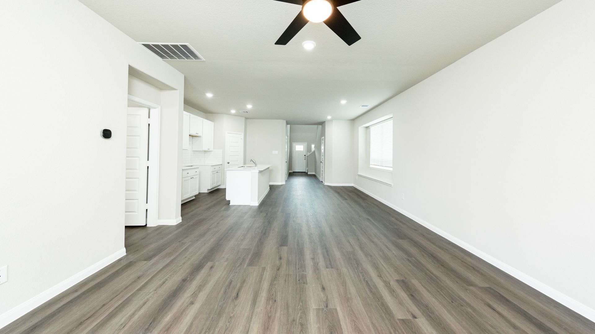 Family Room to Dining Area and Kitchen