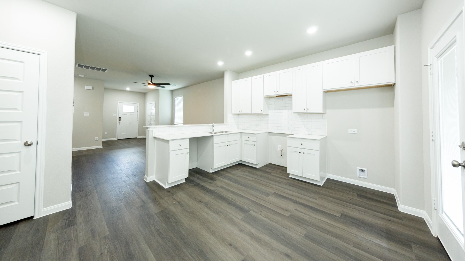 Kitchen and Dining Area to Family Room