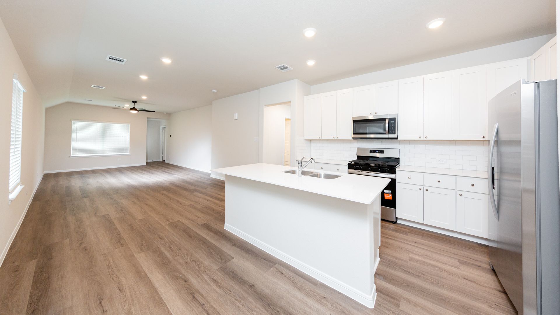 Kitchen to Dining Area and Family Room