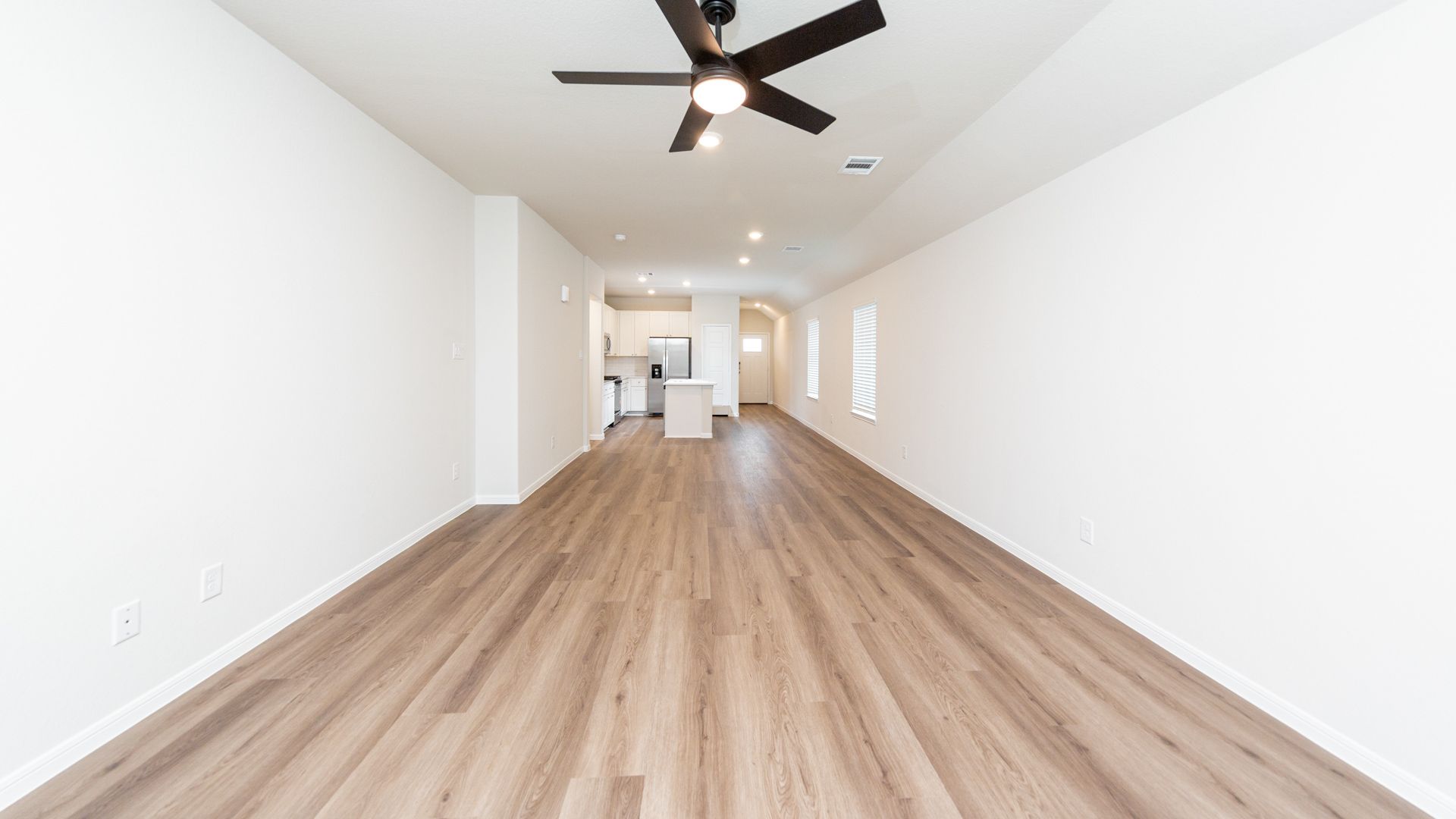 Family Room to Dining Area and Kitchen