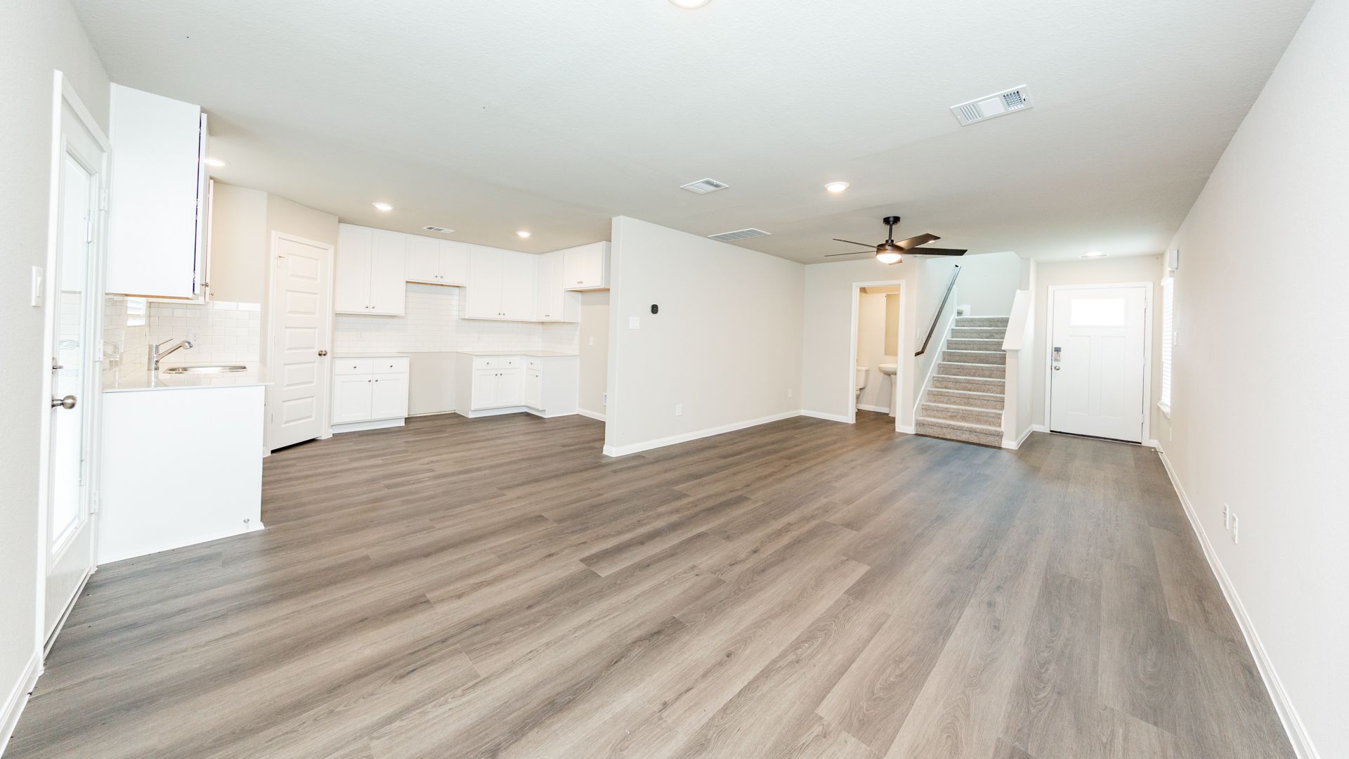 Dining Area to Kitchen and Family Room