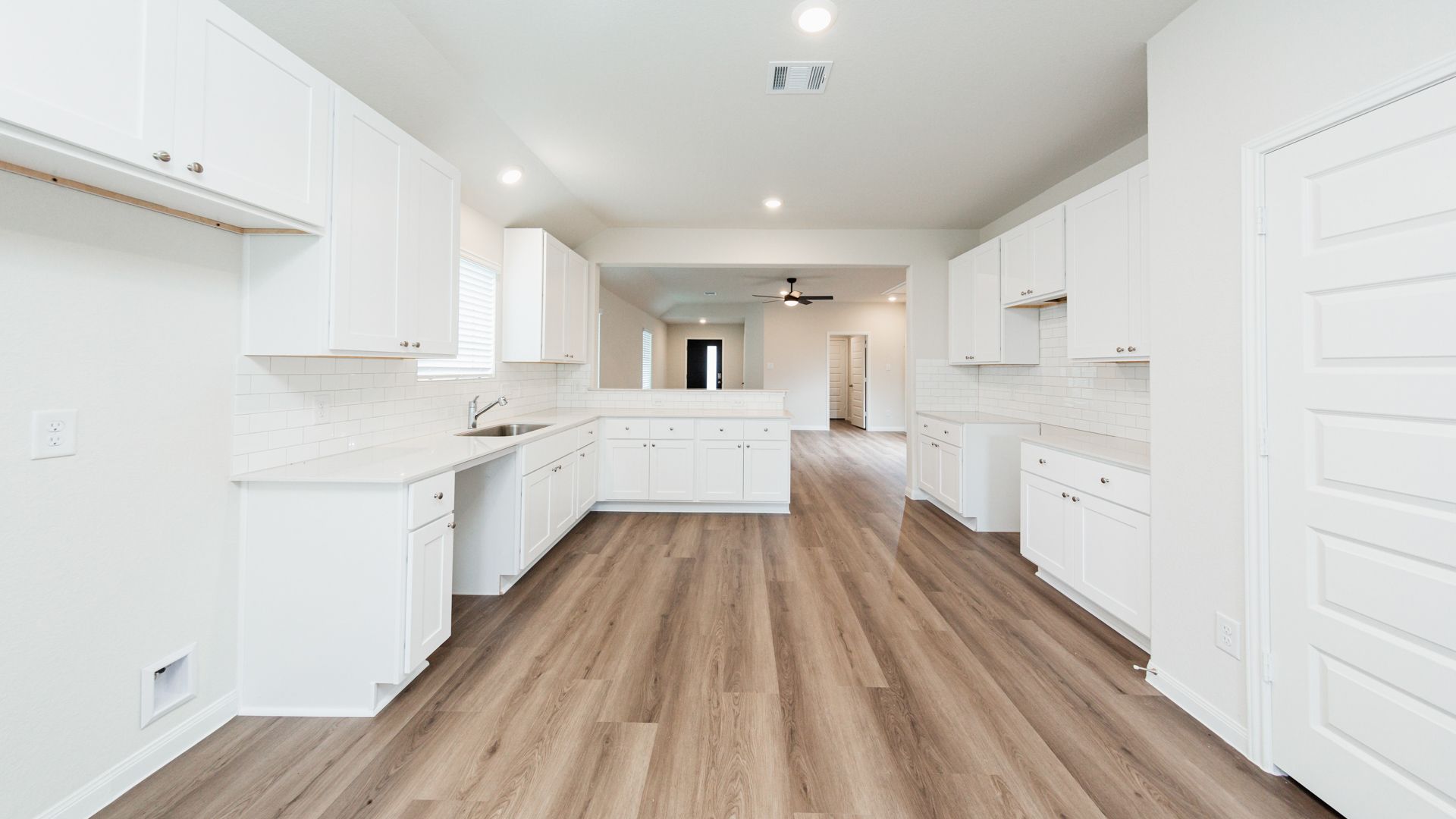 Dining Area to Kitchen and Family Room
