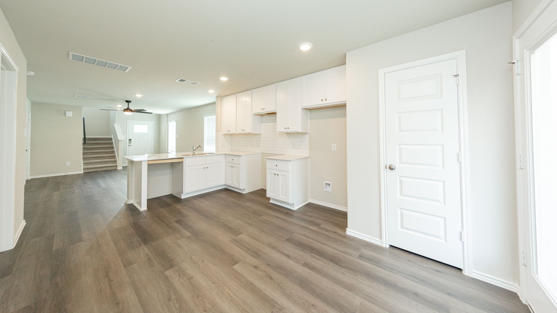 Dining Area to Kitchen and Family Room