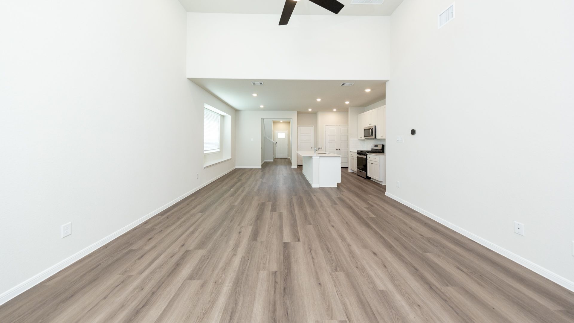 Family Room to Dining Area and Kitchen