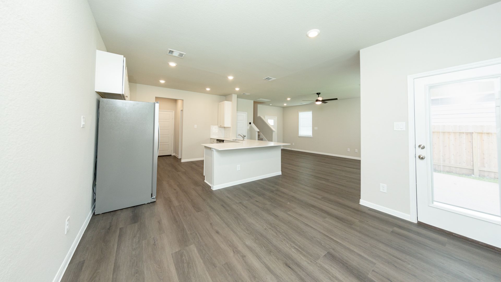 Dining Area to Kitchen and Family Room