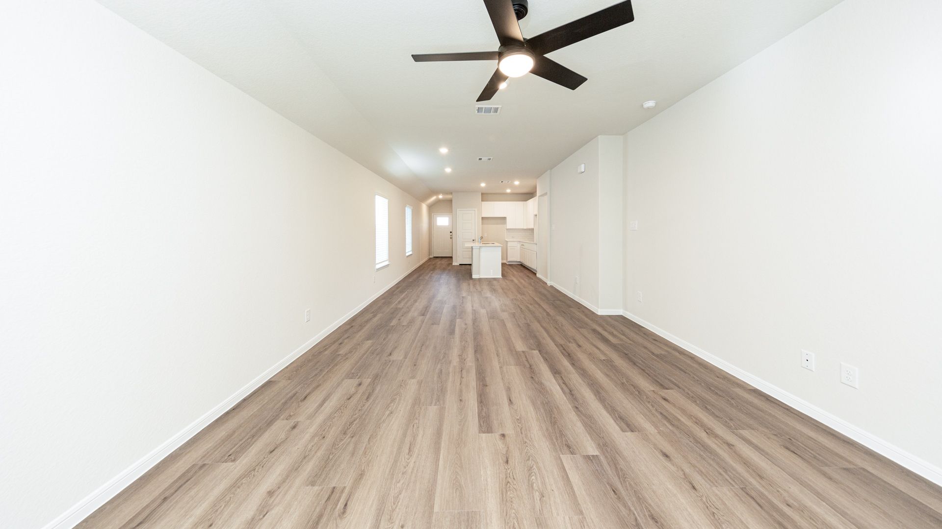 Family Room to Dining Area and Kitchen
