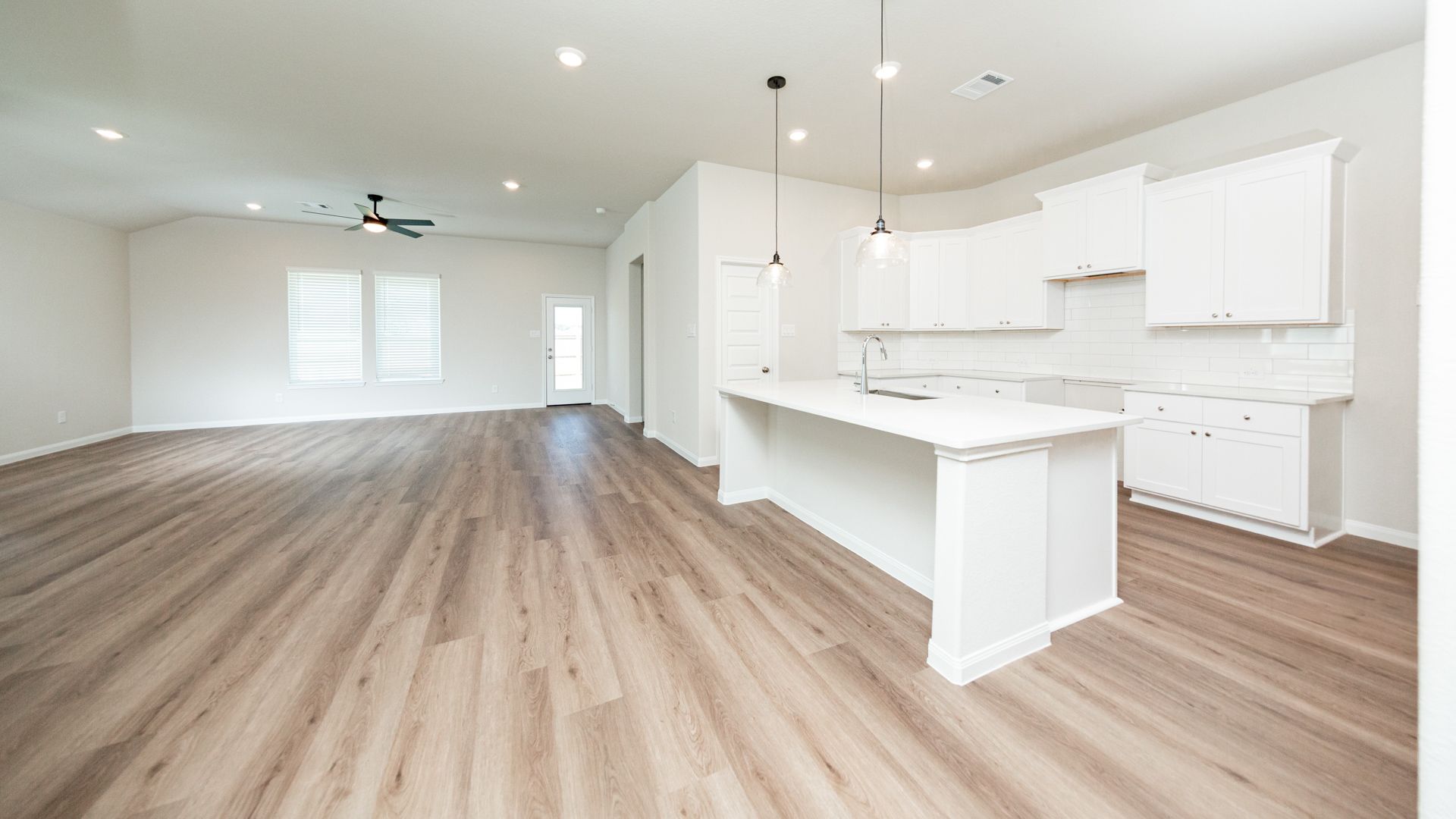 Kitchen and Dining Area to Family Room