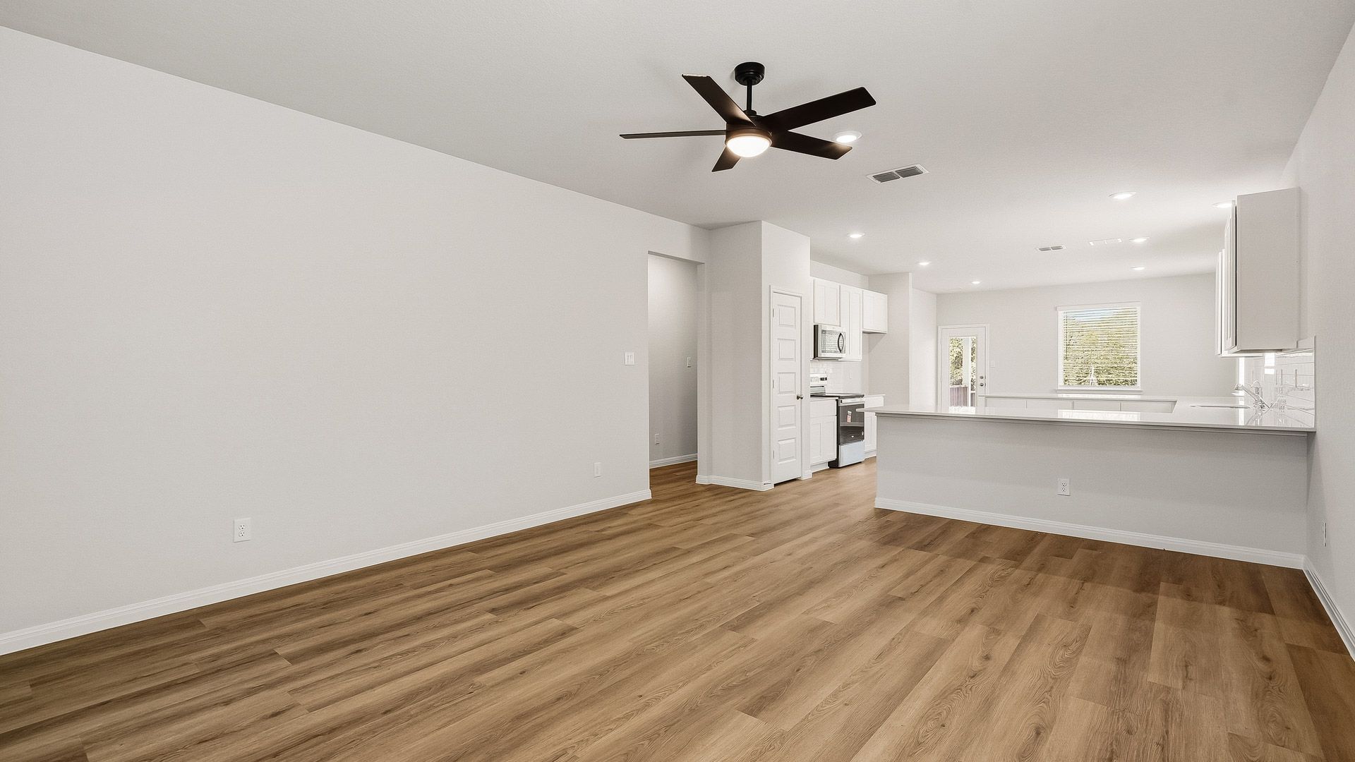 Living area to kitchen
